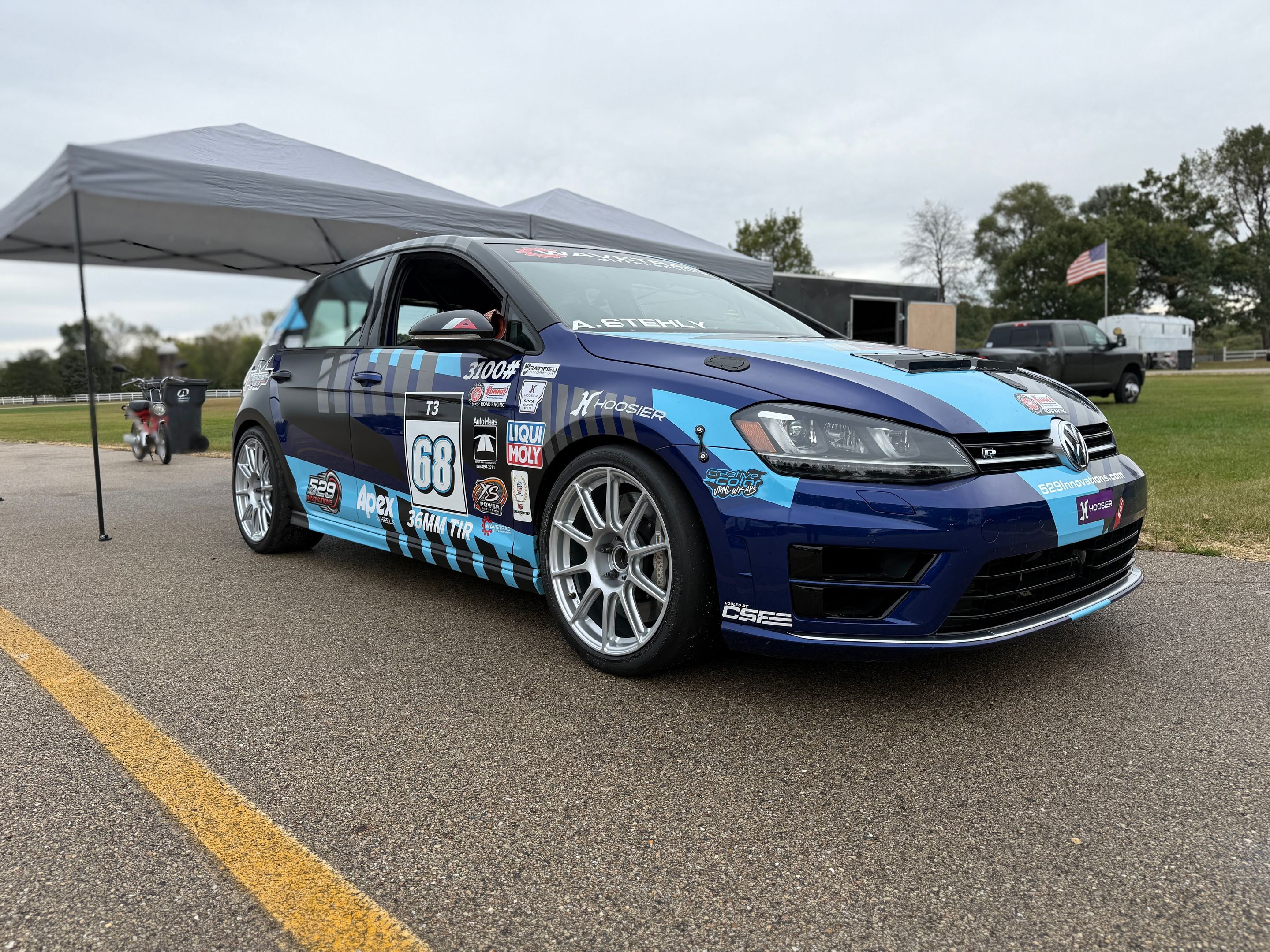 Race Livery VW MK7 Golf R with 18" SM-10 Apex wheels in Race Silver