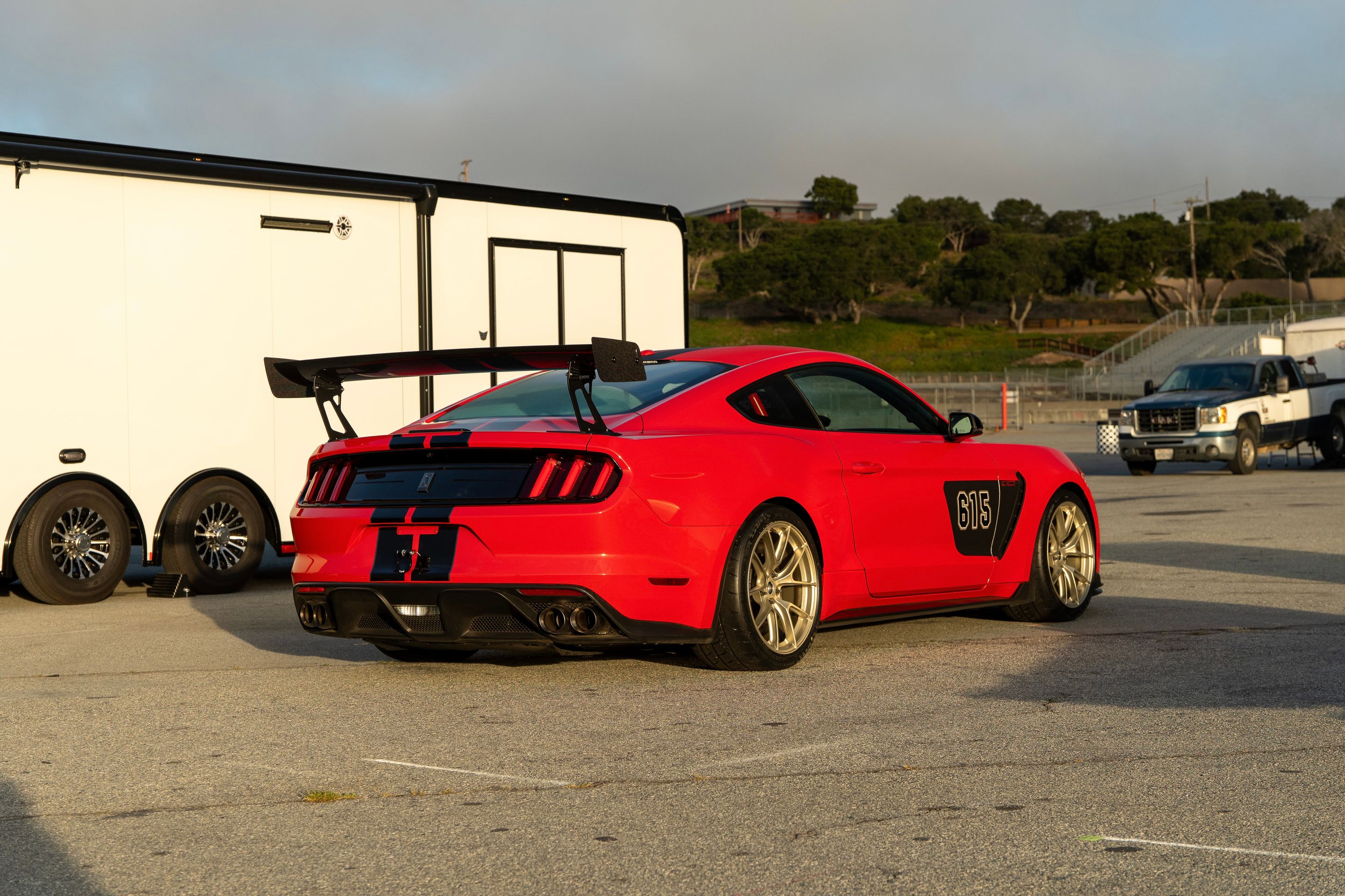 Red Ford S550 Mustang GT350 with 19" VS-5RS Apex wheels in Motorsport Gold