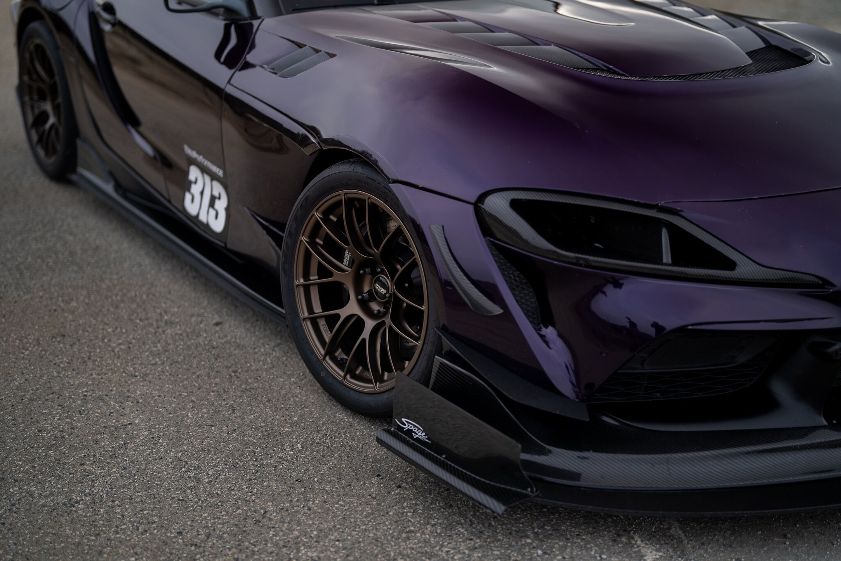Purple Toyota GR Supra with 18" EC-7RS Apex wheels in Satin Bronze