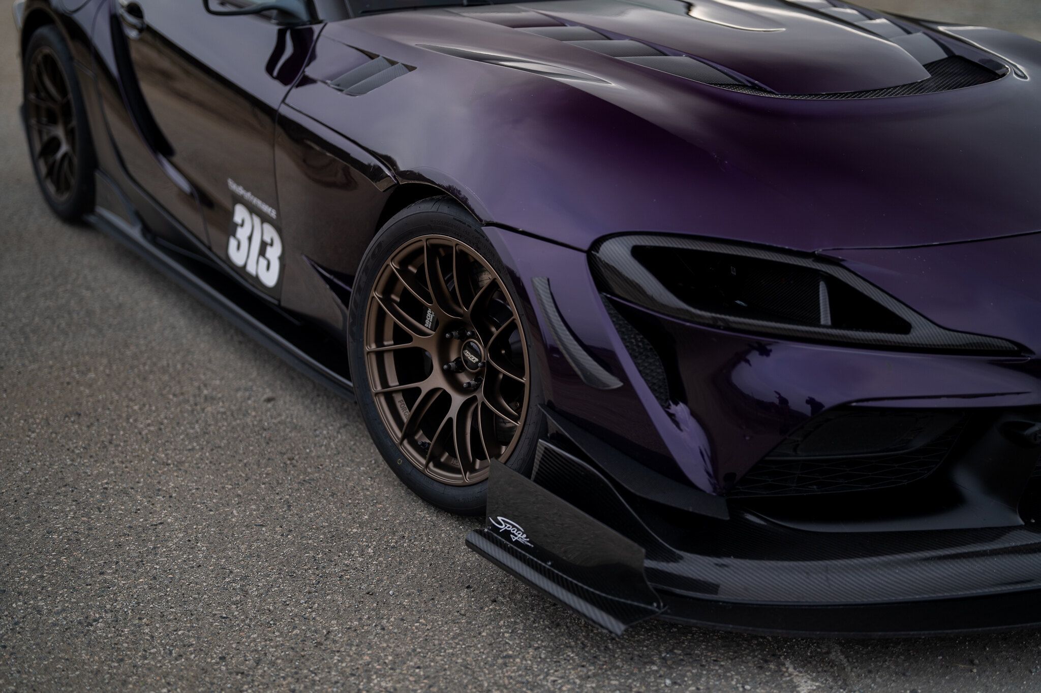 Purple Toyota GR Supra with 18" EC-7RS Apex wheels in Satin Bronze