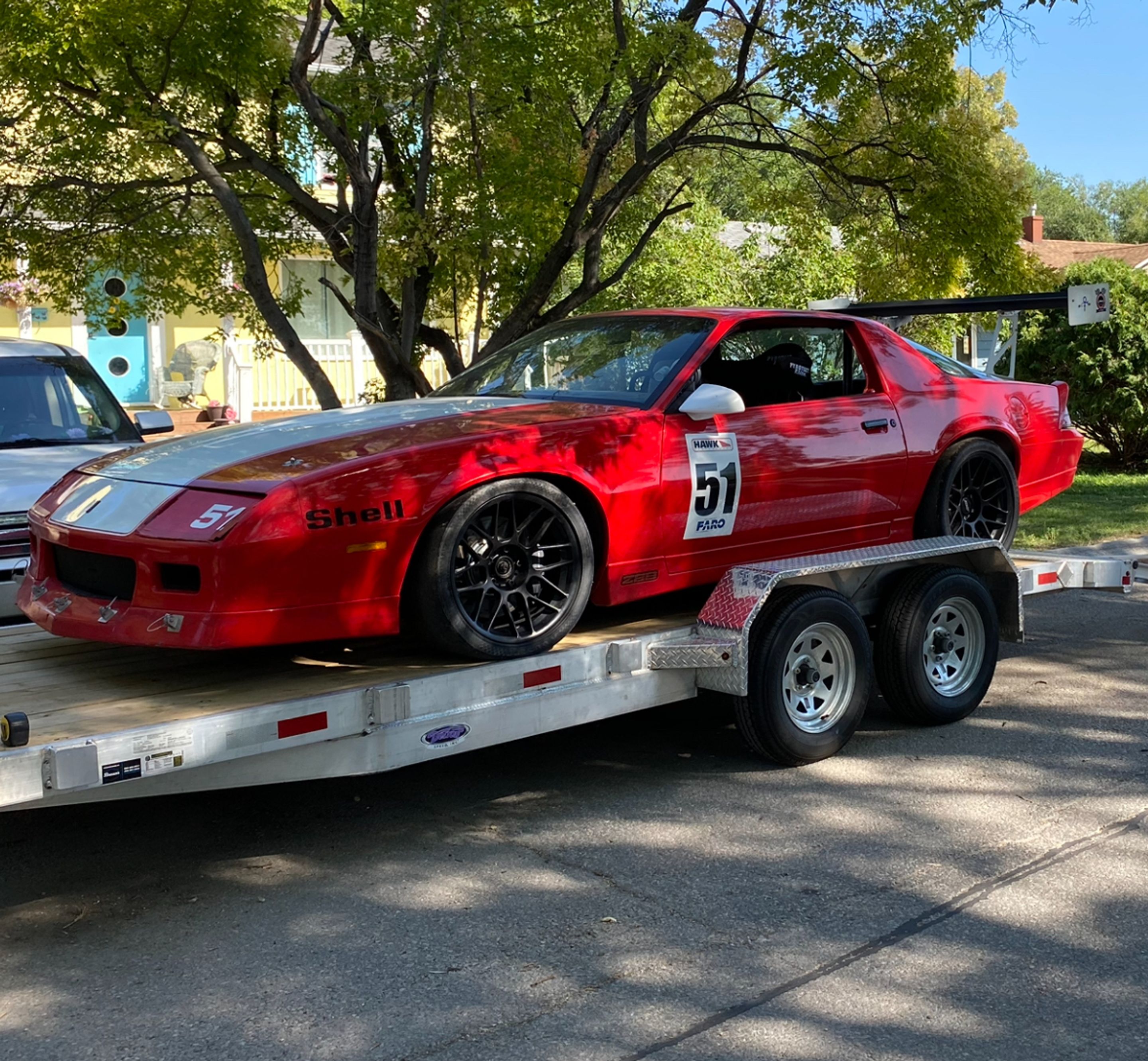 Red Chevrolet 5th Gen Camaro SS with 18" ARC-8 Apex wheels in Satin Black