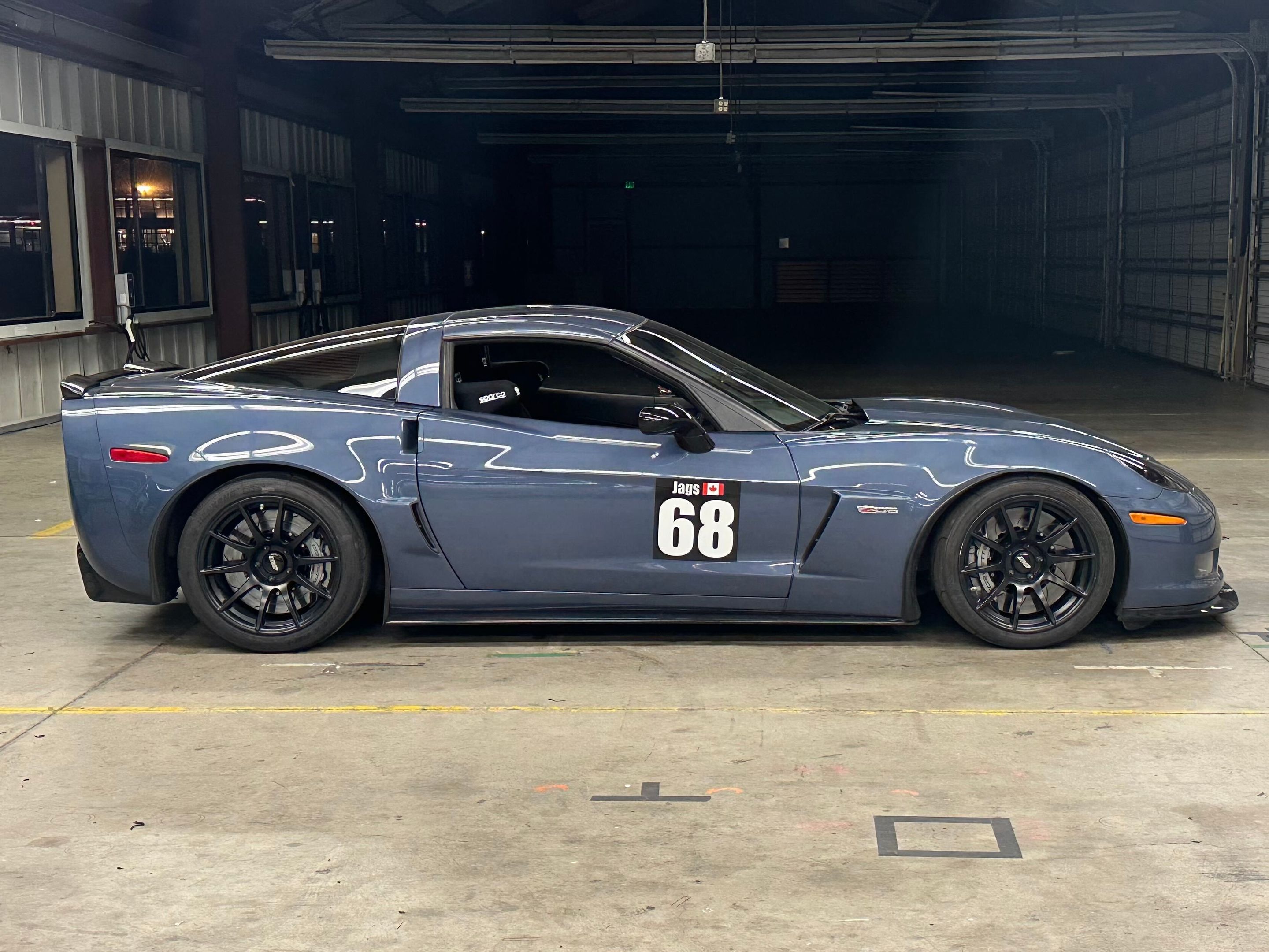 Blue Chevrolet C6 Corvette Z06 with 18" SM-10 Apex wheels in Satin Black