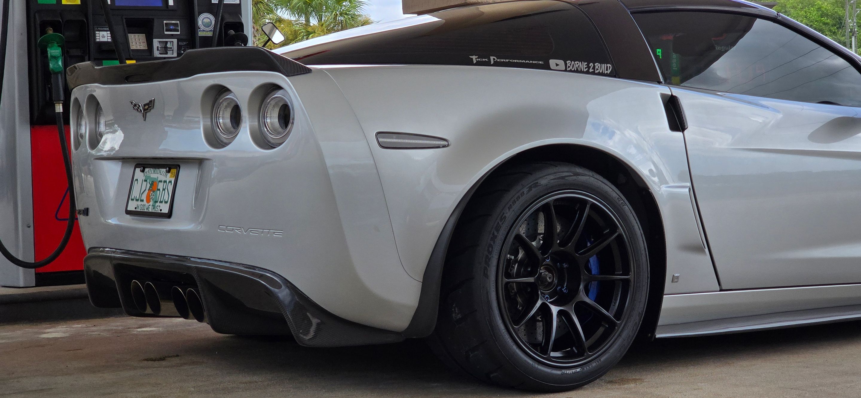 Silver Chevrolet C6 Corvette ZR-1 with 18" SM-10RE Apex wheels in Satin Black