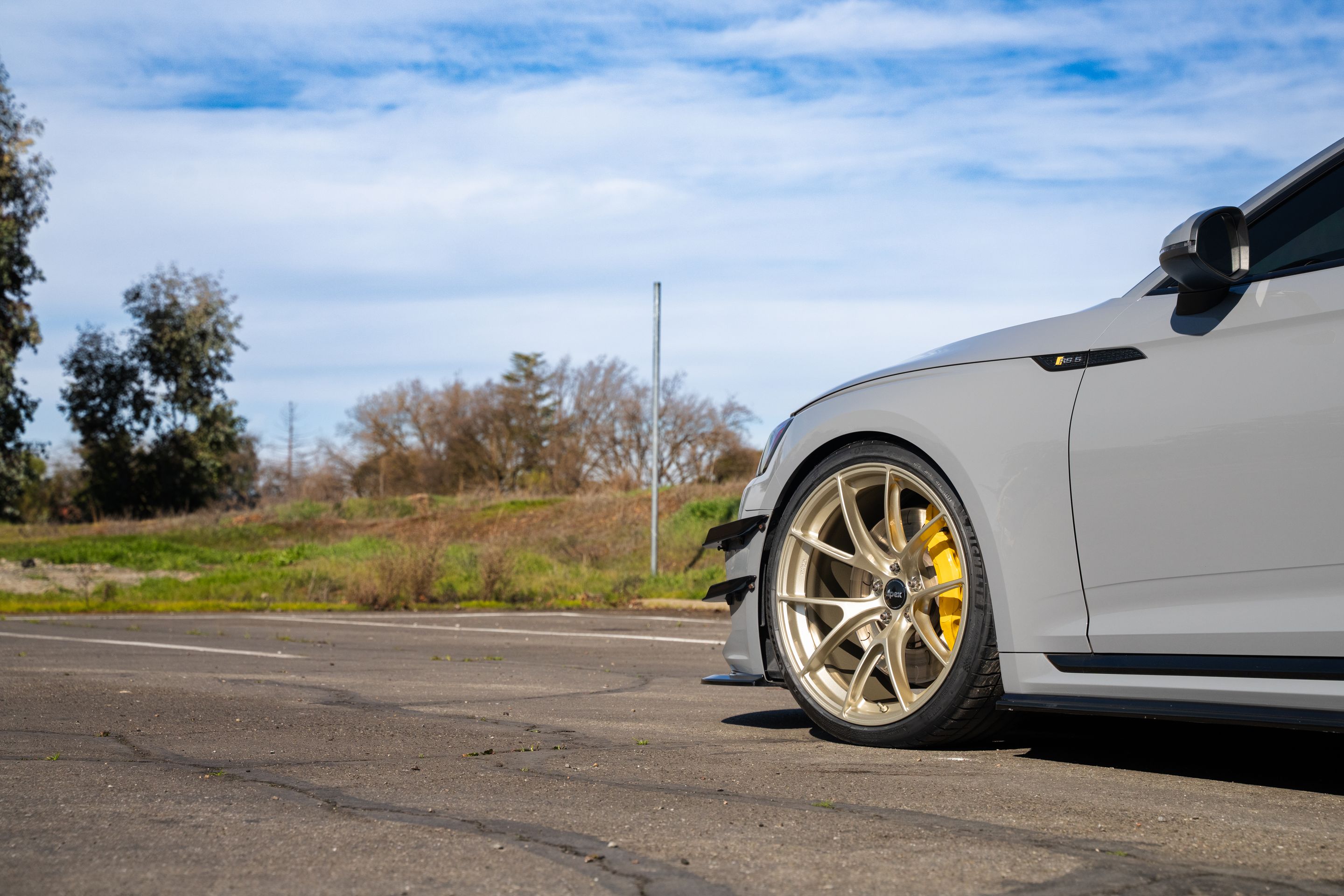 Grey Audi B9 RS 5 Coupe with 20" VS-5RS Apex wheels in Motorsport Gold