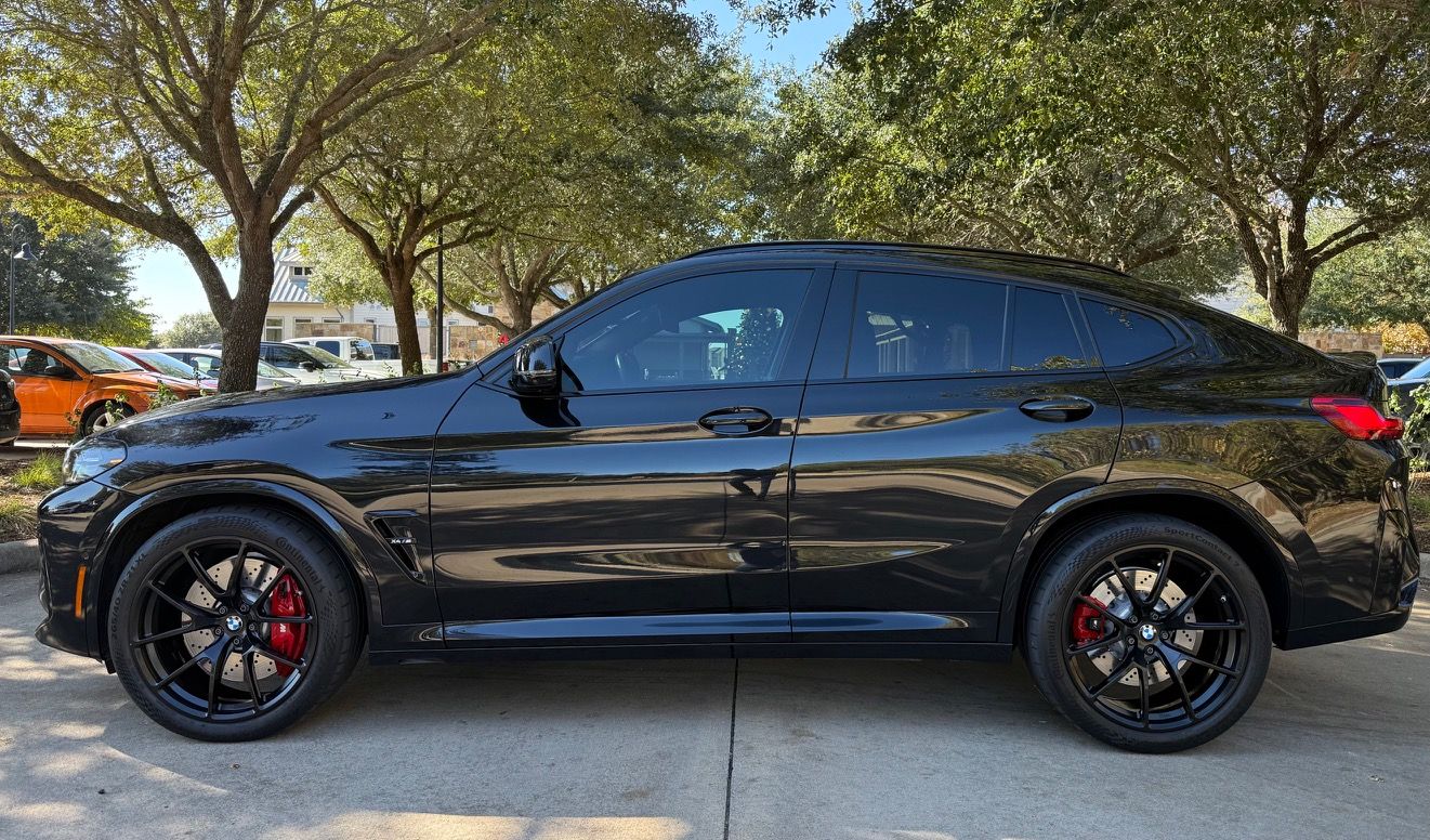 Black BMW F98 X4M with 21" VS-5RX Apex wheels in Satin Black