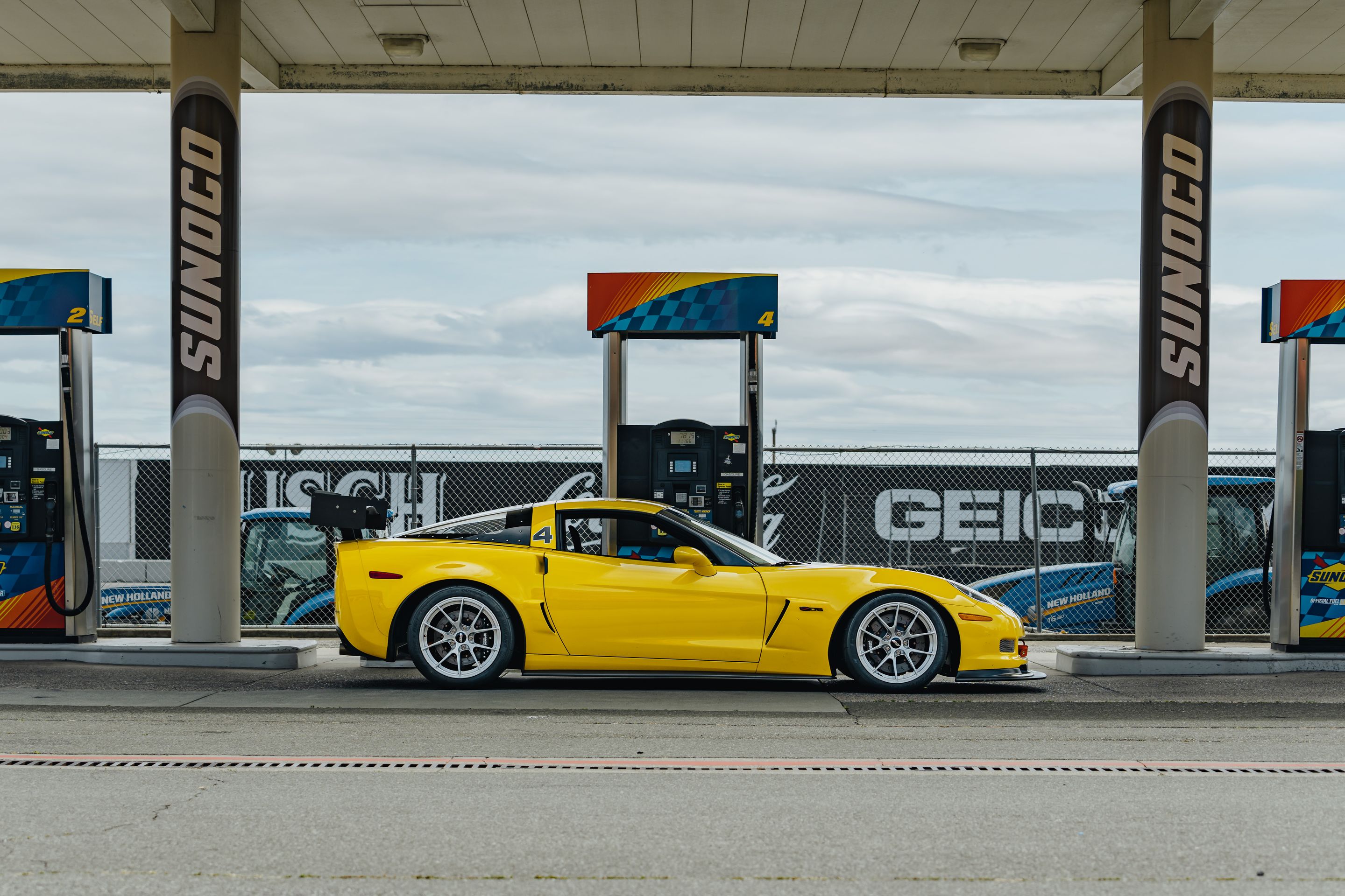 Yellow Chevrolet C6 Corvette Z06 with 18" VS-5RS Apex wheels in Brushed Clear