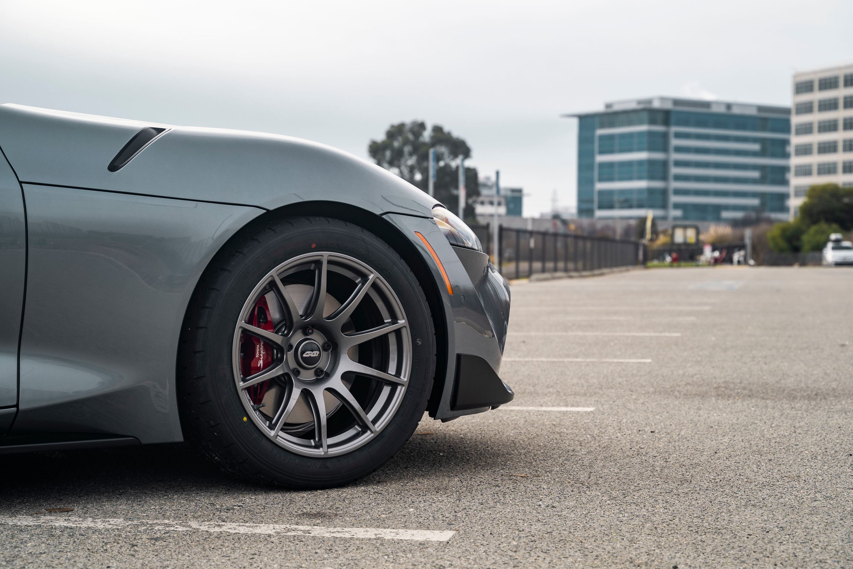 Grey Toyota GR Supra with 18" SM-10 Apex wheels in Anthracite