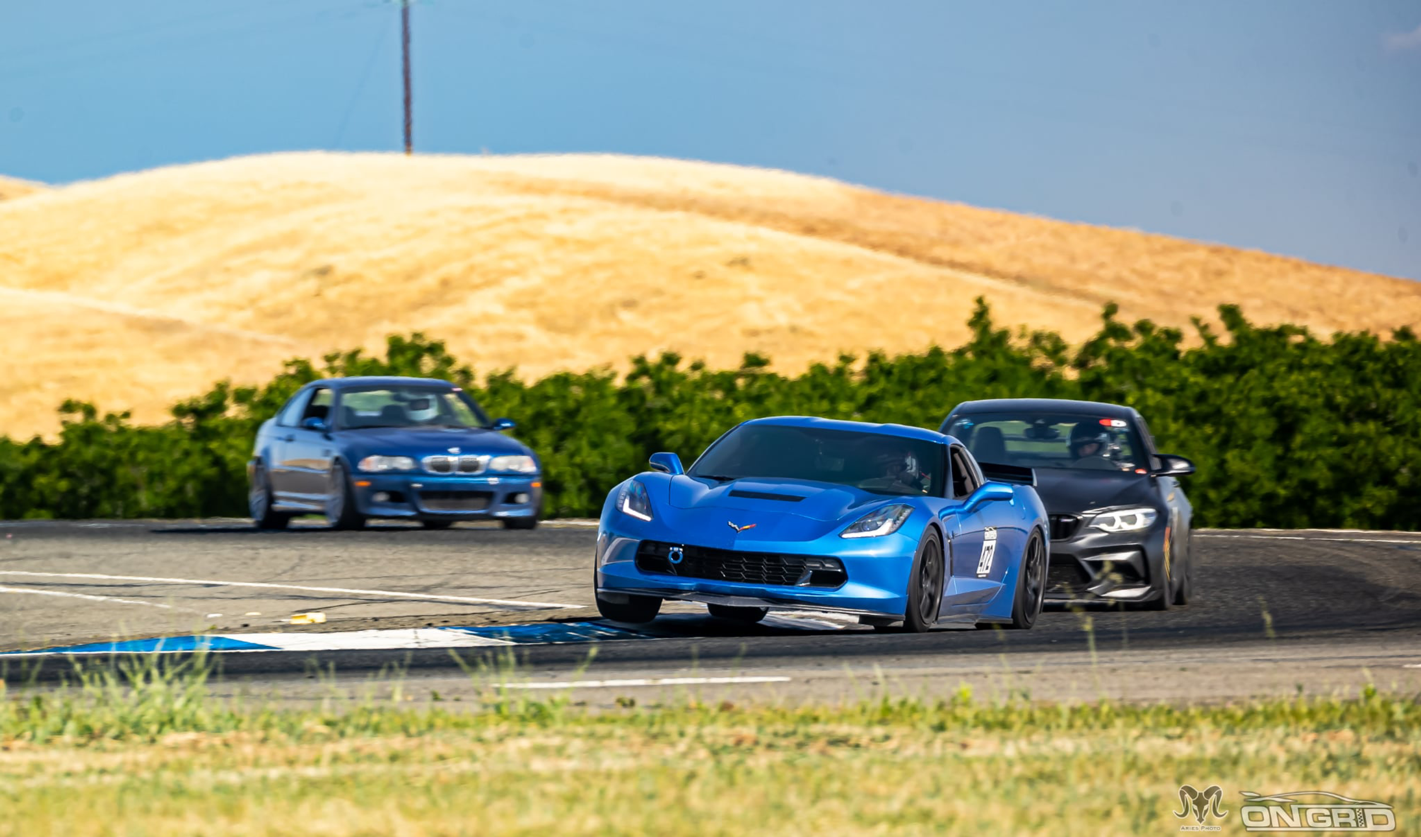 Blue Chevrolet C7 Corvette Stingray/Z51 with 18"/19" EC-7 Apex wheels in Satin Black