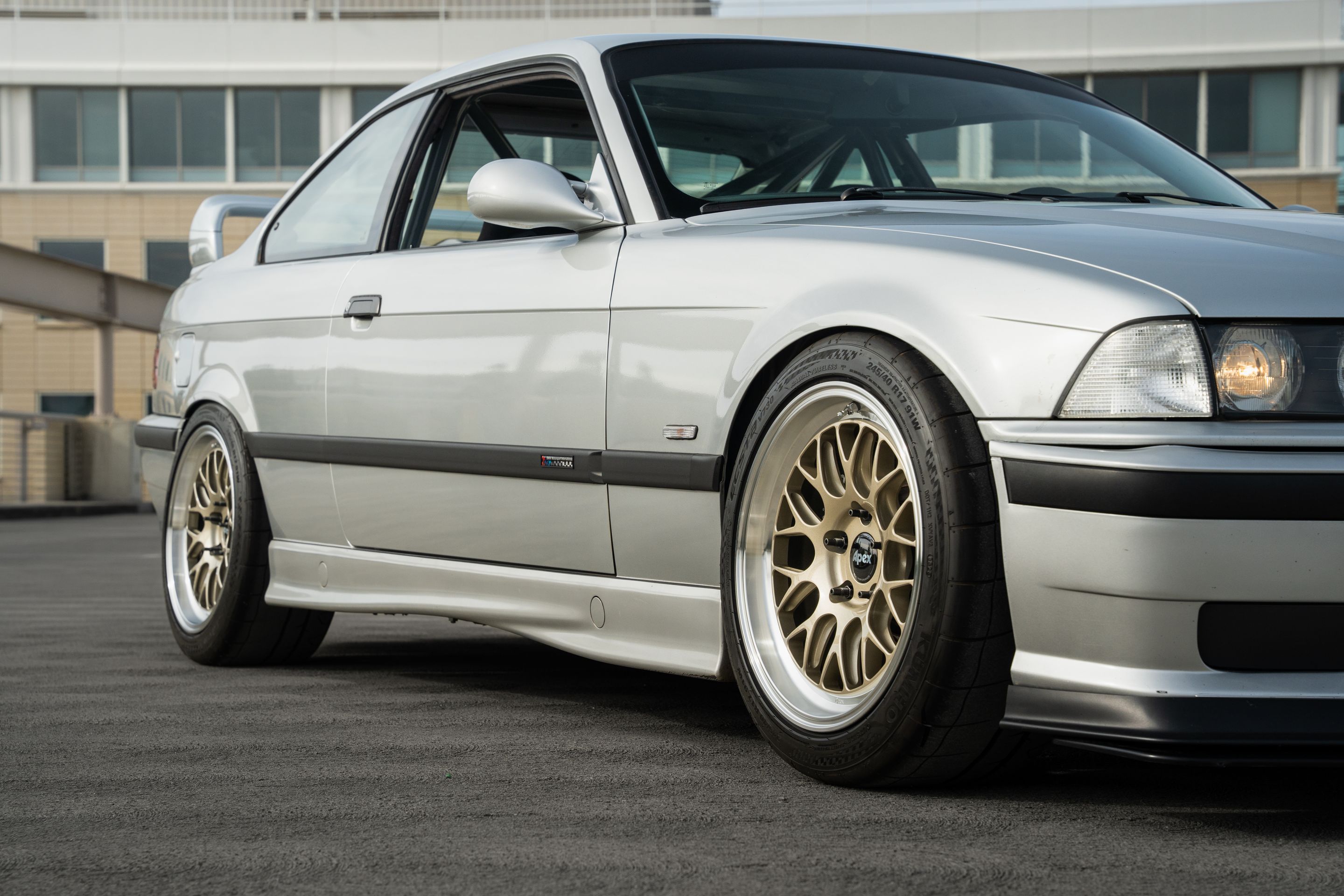 Silver BMW E36 3 Series with 17" ML-10RT Apex wheels in Machined Lip Gloss Motorsport Gold