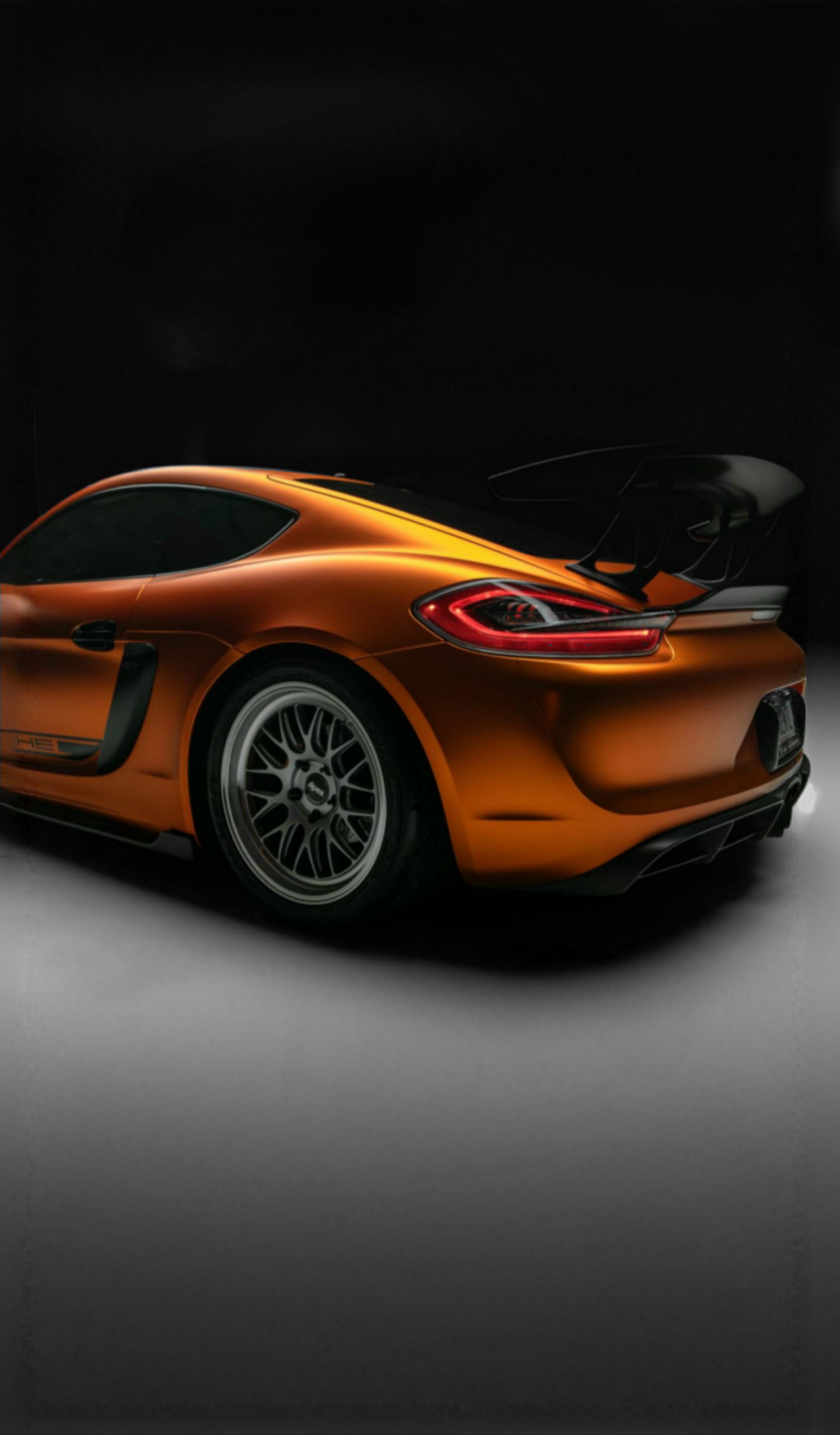 Orange Porsche 981 Cayman GT4 with 19" ML-10RT Apex wheels in Machined Lip Race Silver