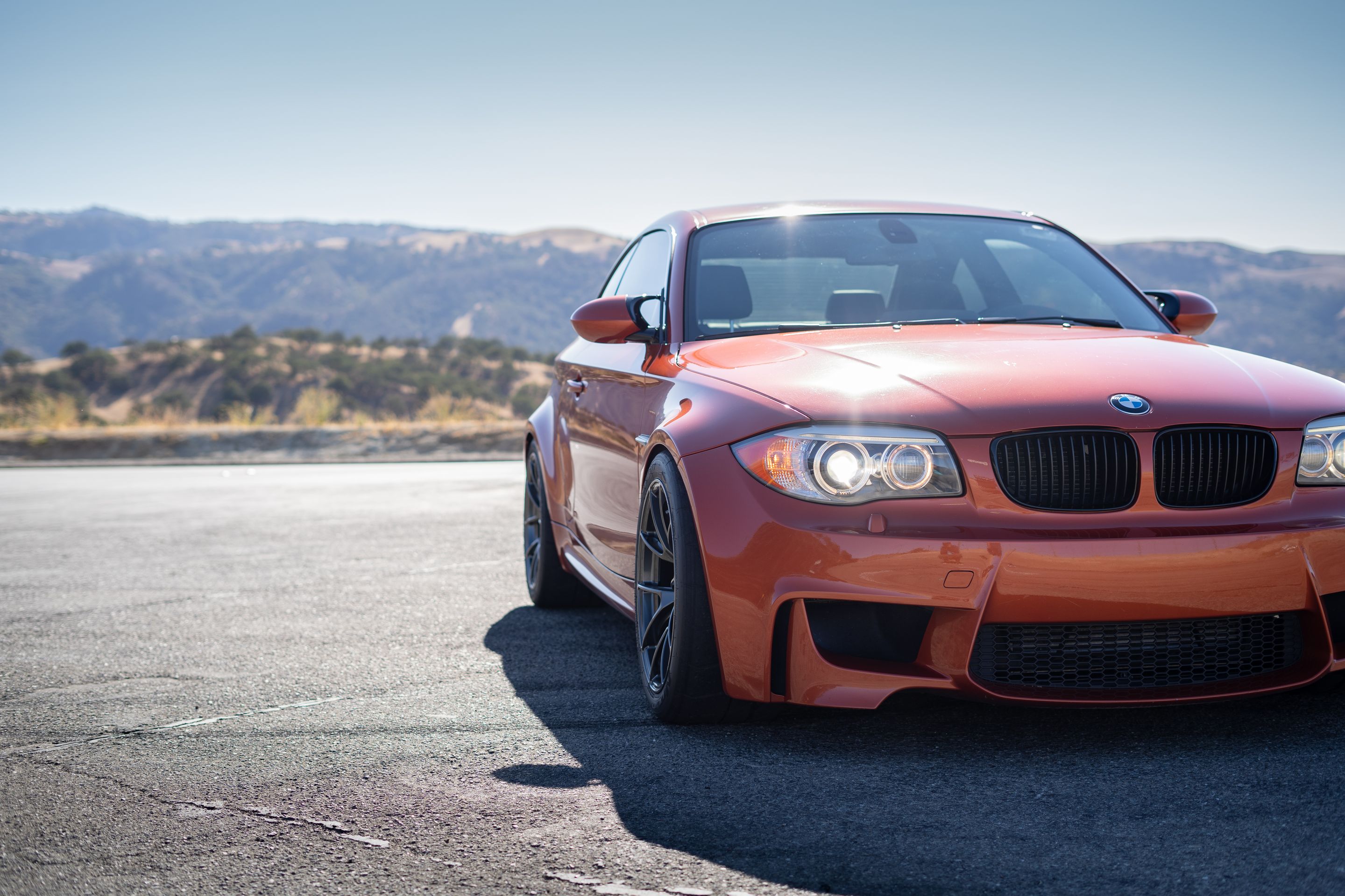 Orange BMW E82 1M with 18" VS-5RS Apex wheels in Anthracite