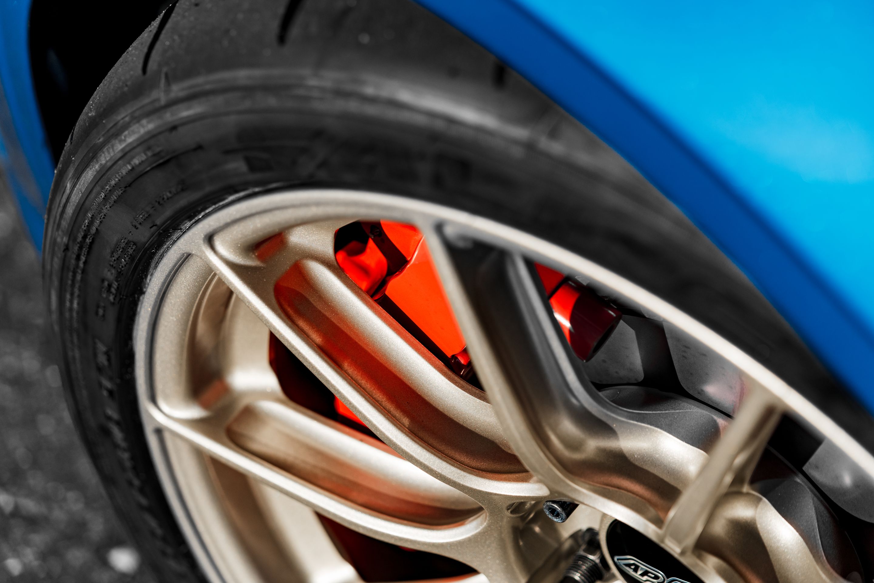 Blue Audi 8V RS 3 with 18" SM-10RS Apex wheels in Motorsport Gold