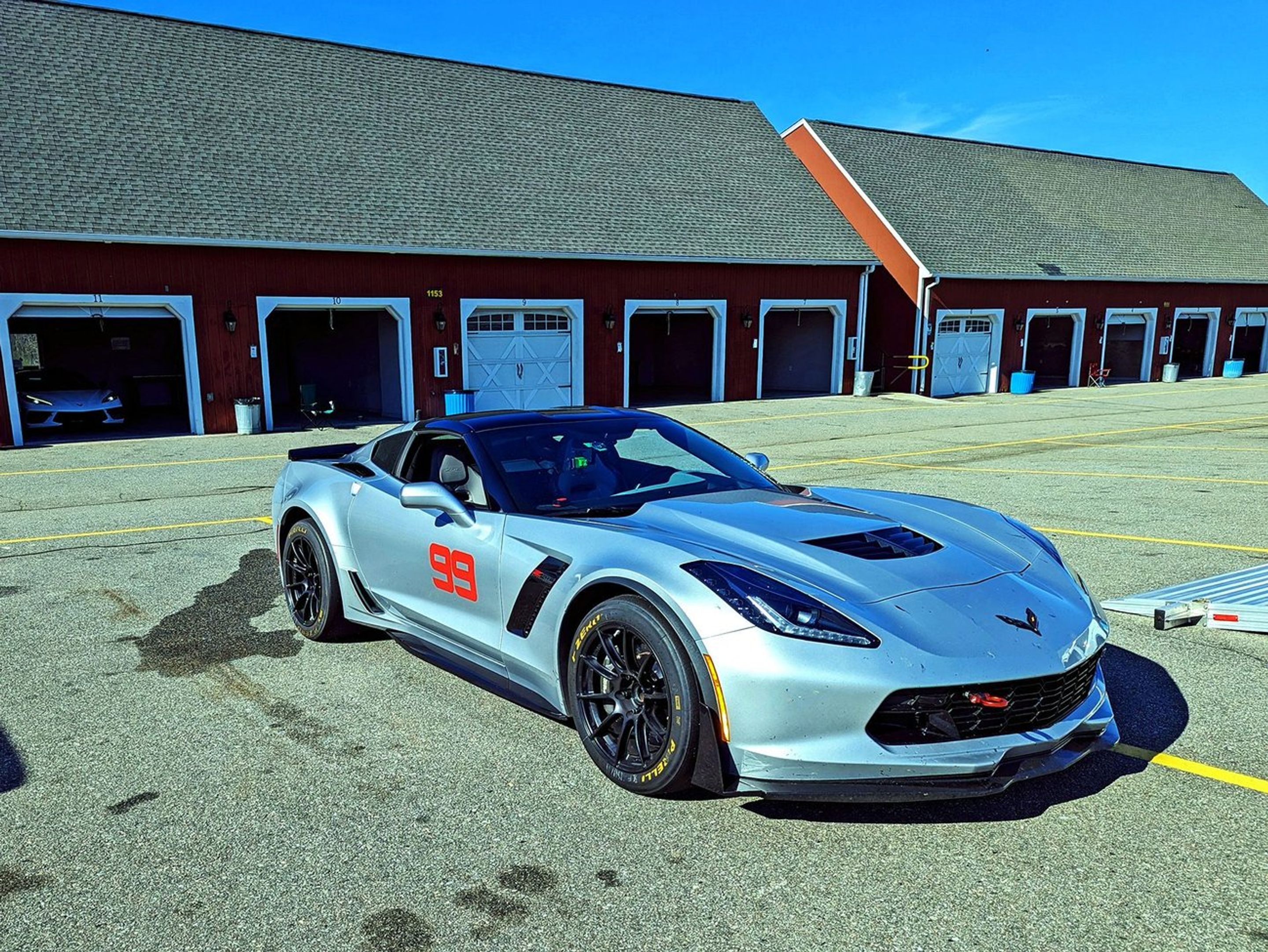 Silver Chevrolet C7 Corvette Z06 with 18" SM-10RS Apex wheels in Satin Black