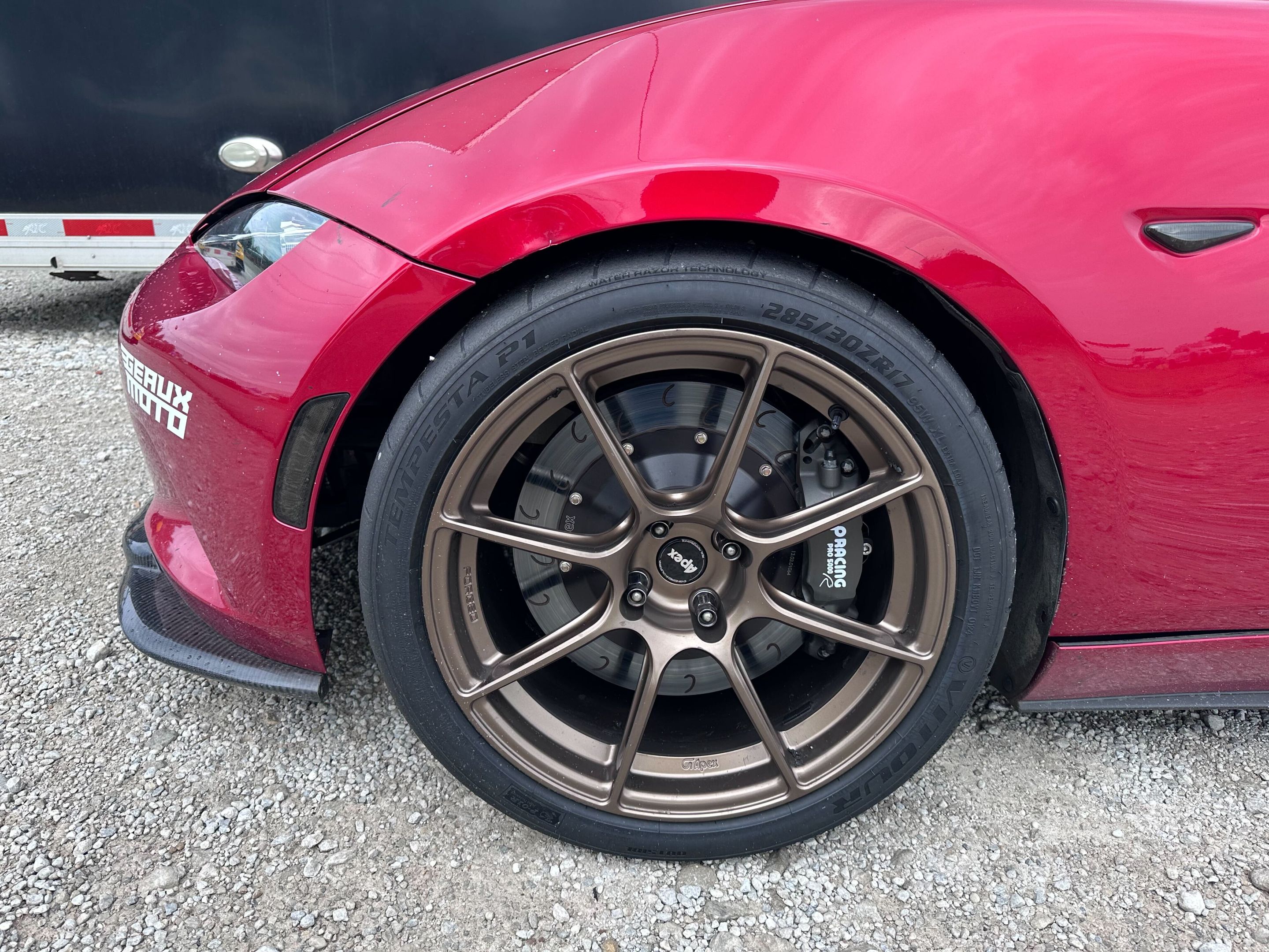 Red Mazda ND MX-5 Miata with 17" SM-8RS Apex wheels in Satin Bronze