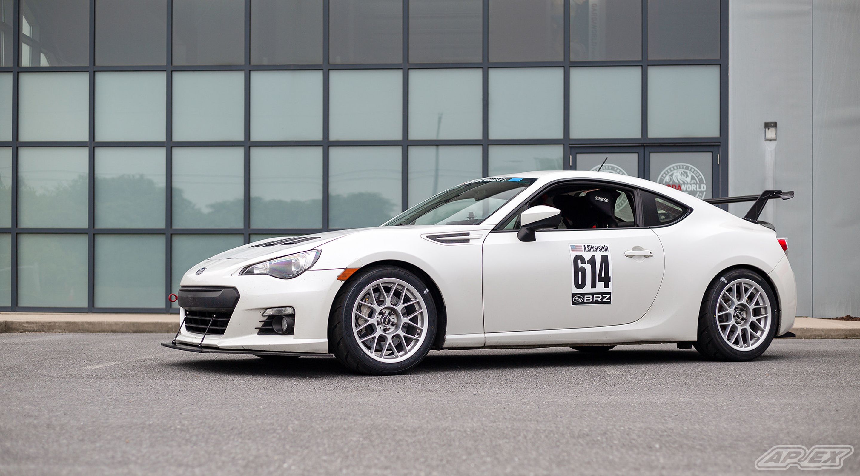 White Subaru ZC6 / Gen 1 BRZ with 17" ARC-8 Apex wheels in Race Silver