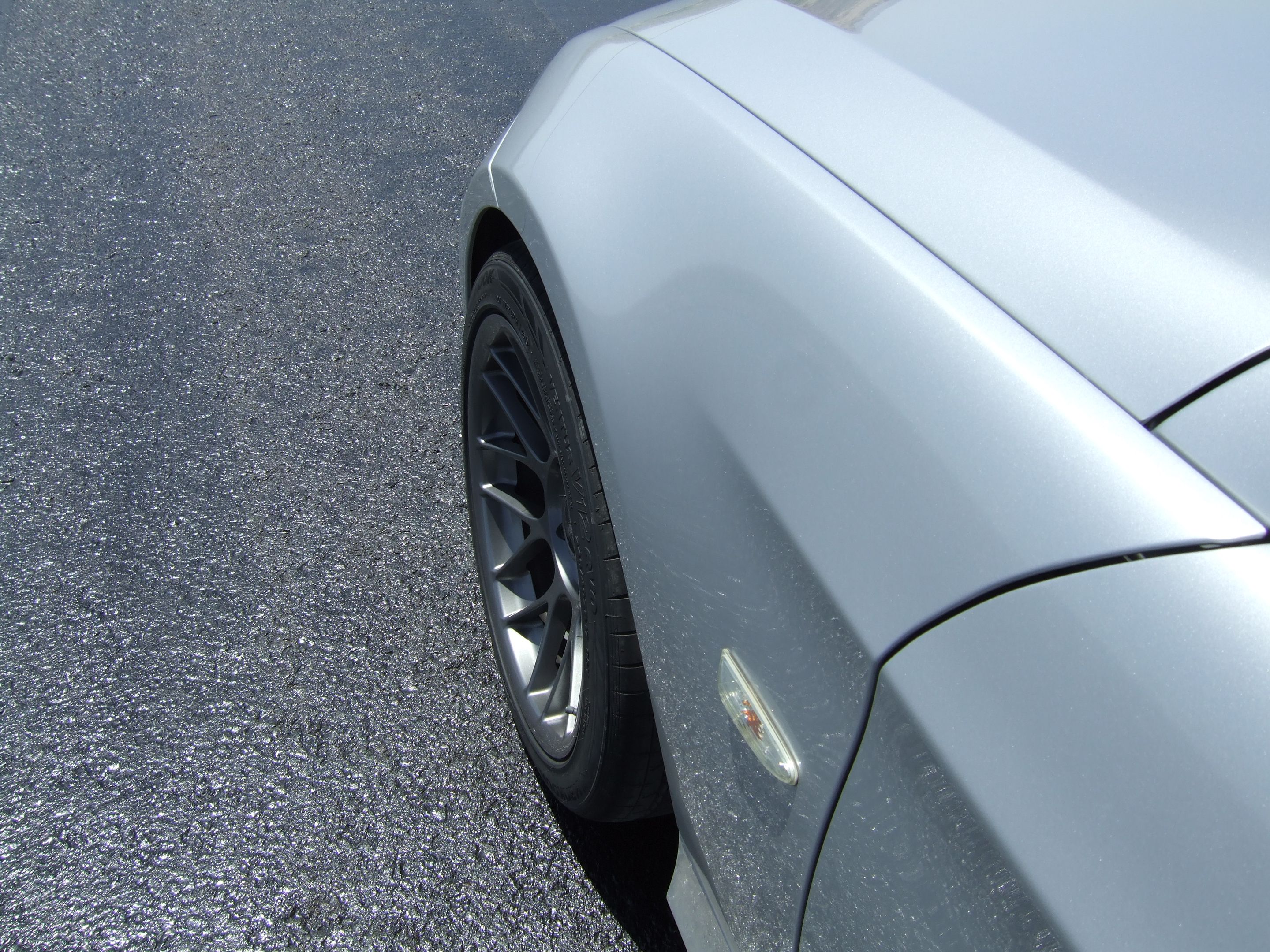 Silver BMW E91 Wagon 3 Series with 17" ARC-8 Apex wheels in Anthracite