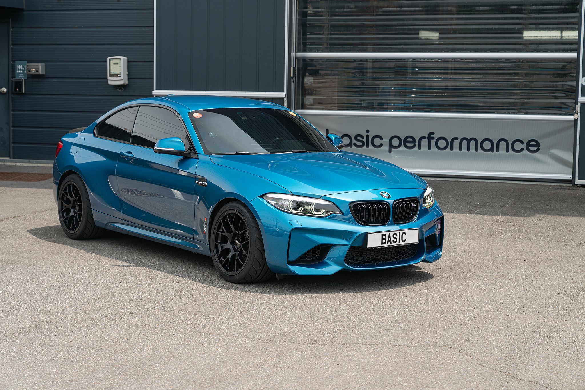 Blue BMW F87 M2 with 18" EC-7 Apex wheels in Satin Black