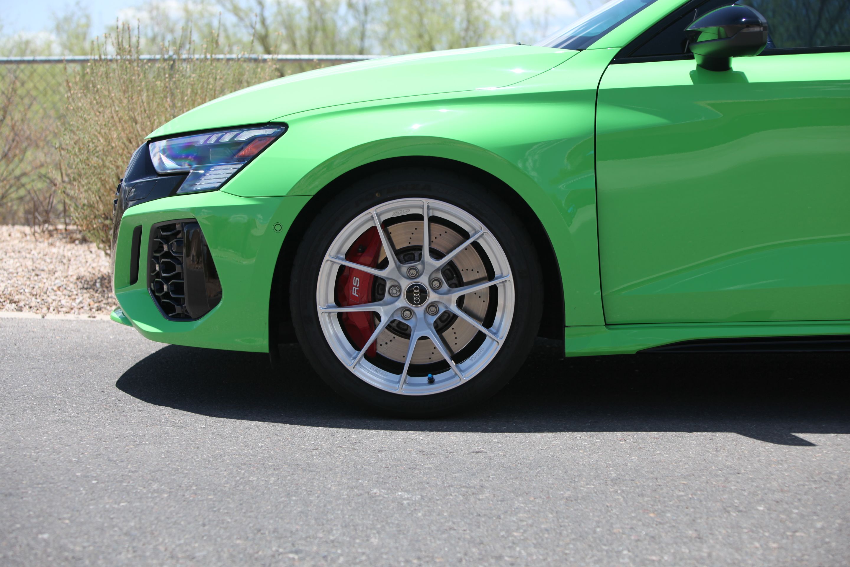 Green Audi 8Y RS 3 with 18" VS-5RS Apex wheels in Brushed Clear