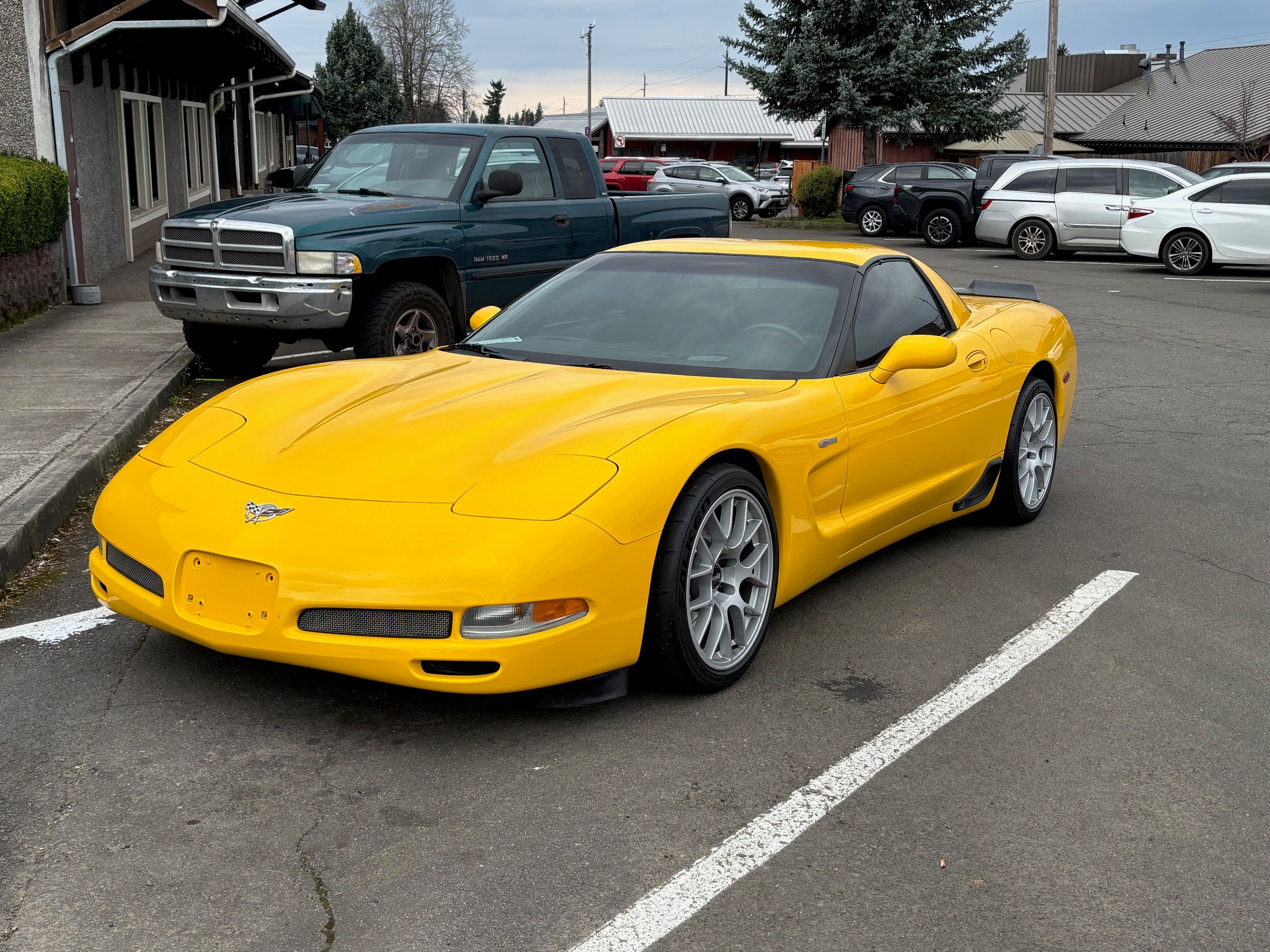 Yellow Chevrolet C5 Corvette Z06 with 18" EC-7 Apex wheels in Race Silver
