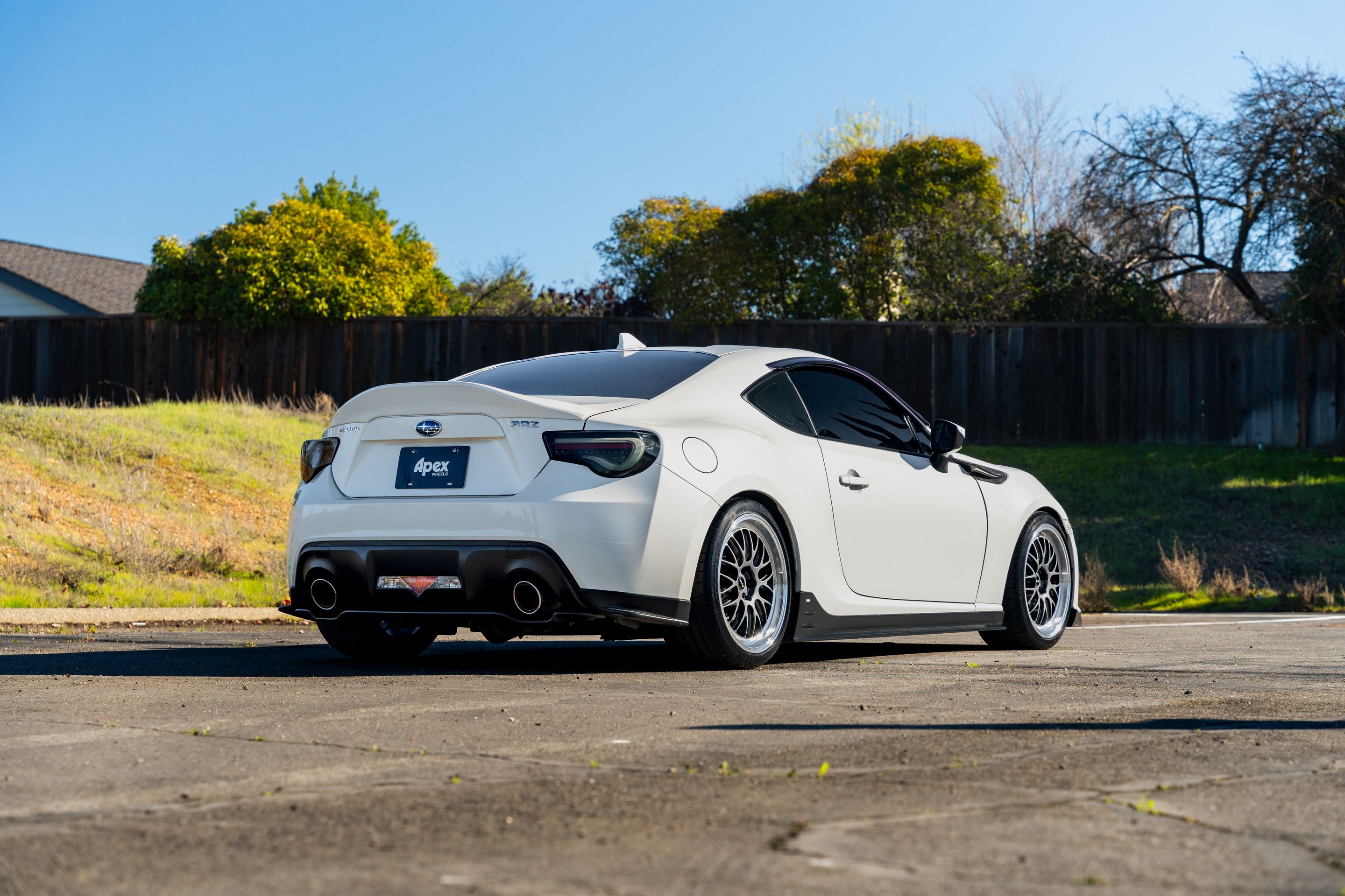 White Subaru ZC6 / Gen 1 BRZ with 18" ML-10RT Apex wheels in Machined Lip Anthracite