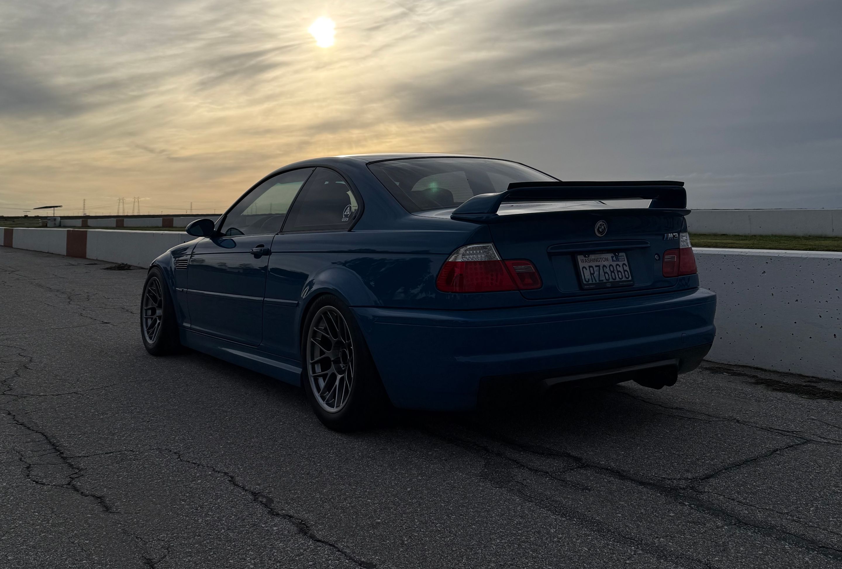 Blue BMW E46 M3 with 17" ARC-8 Apex wheels in Hyper Black