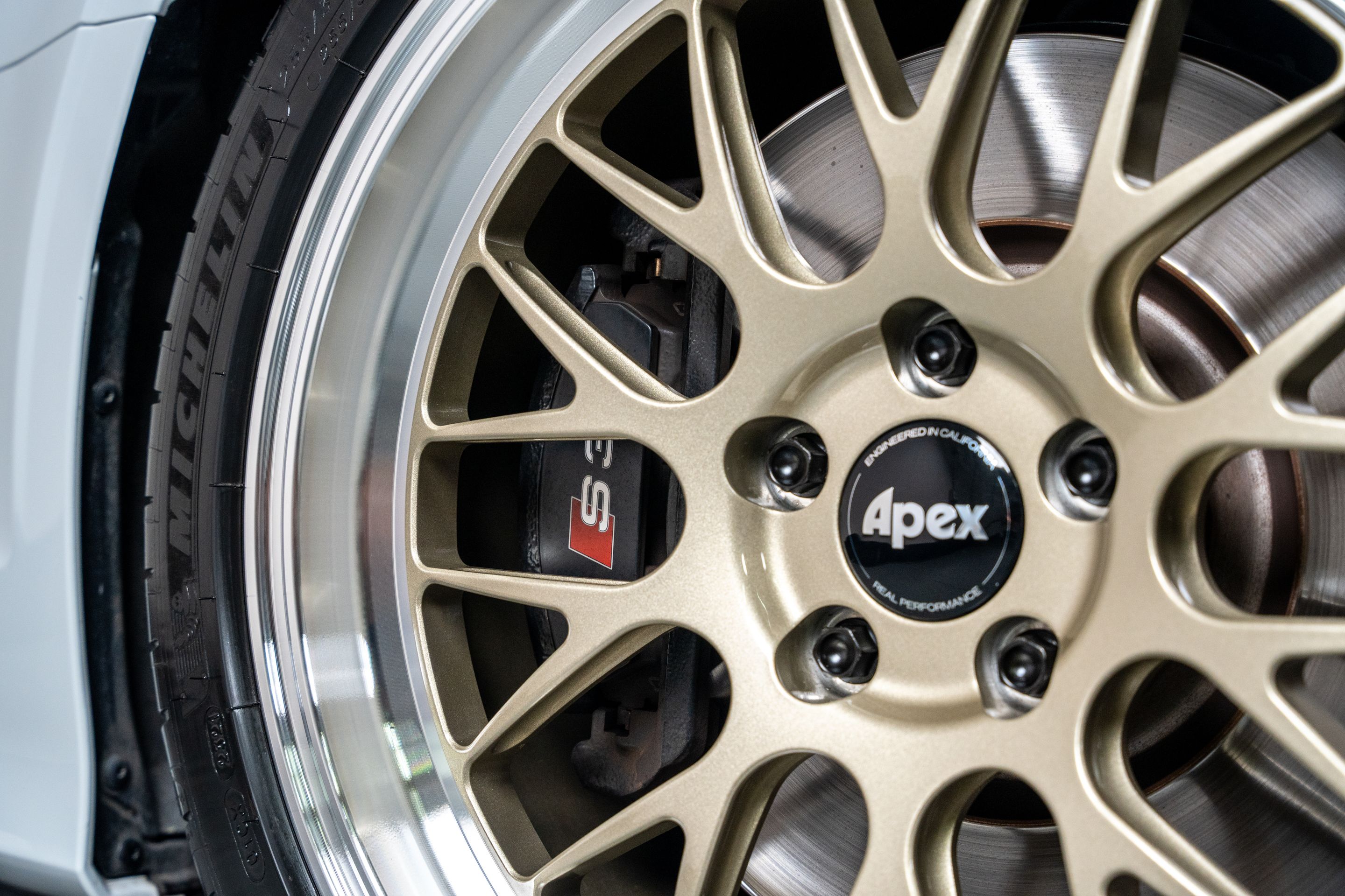 White Audi 8V S3 with 18" ML-10RT Apex wheels in Machined Lip Gloss Motorsport Gold