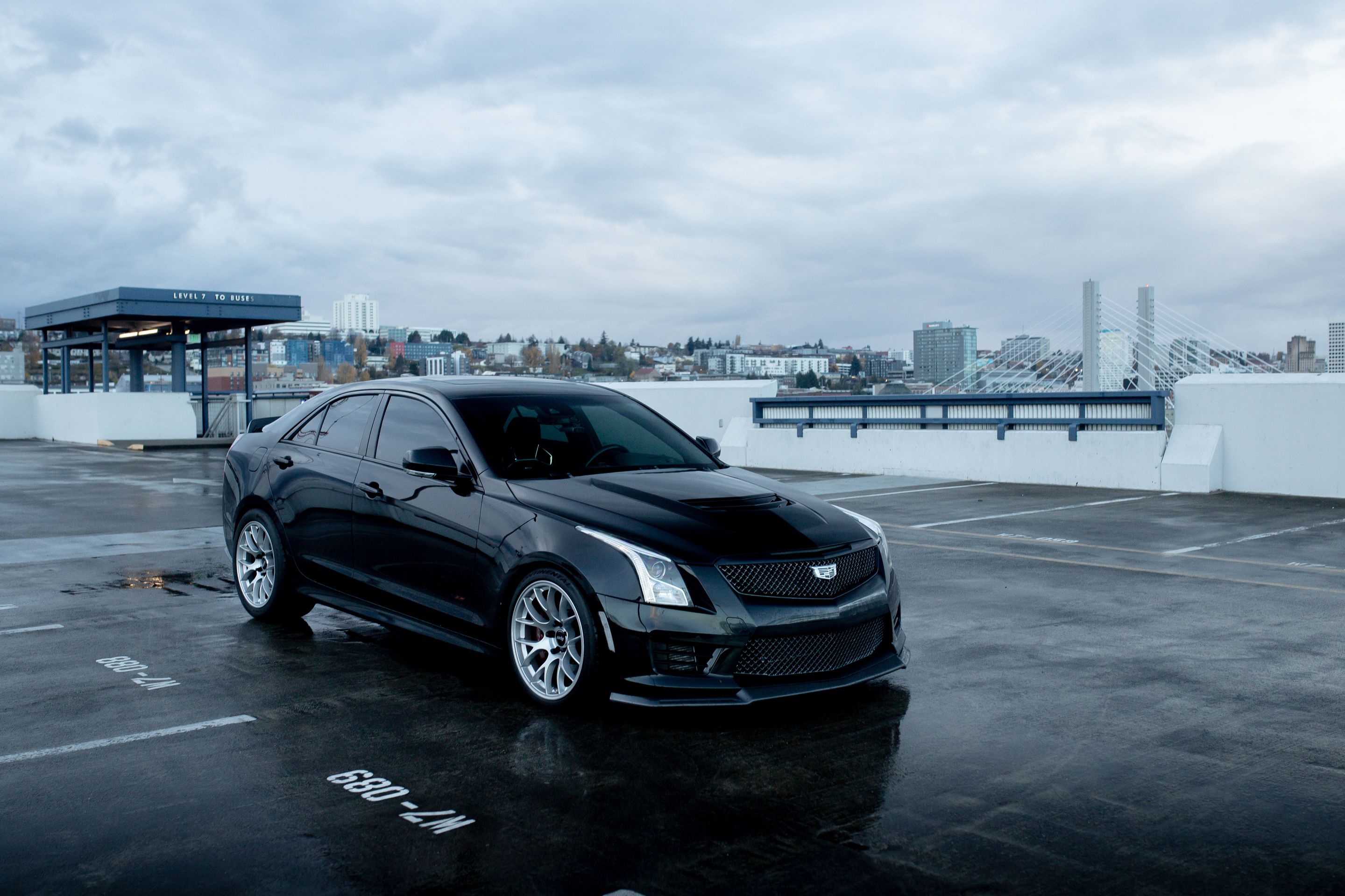 Black Cadillac ATS-V with 18" EC-7 Apex wheels in Race Silver