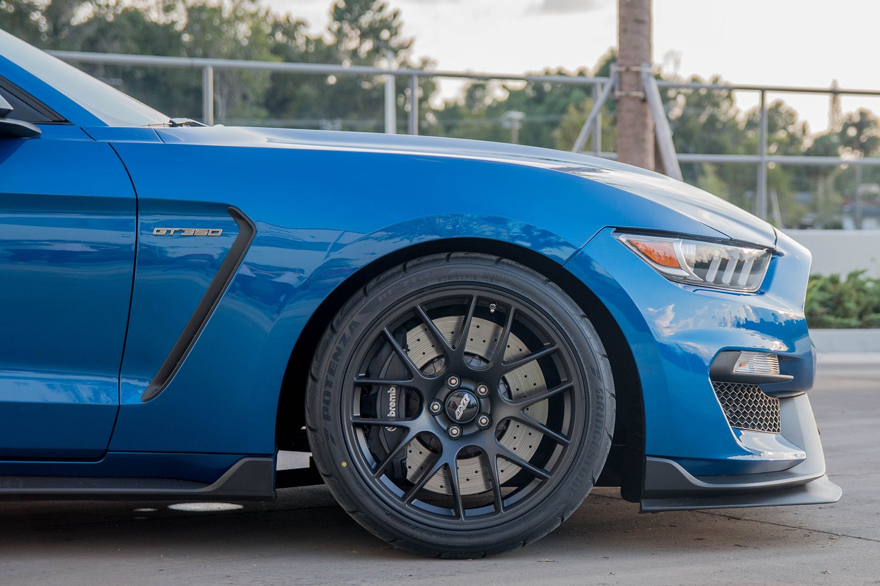 Blue Ford S550 Mustang GT350 with 19" EC-7 Apex wheels in Satin Black