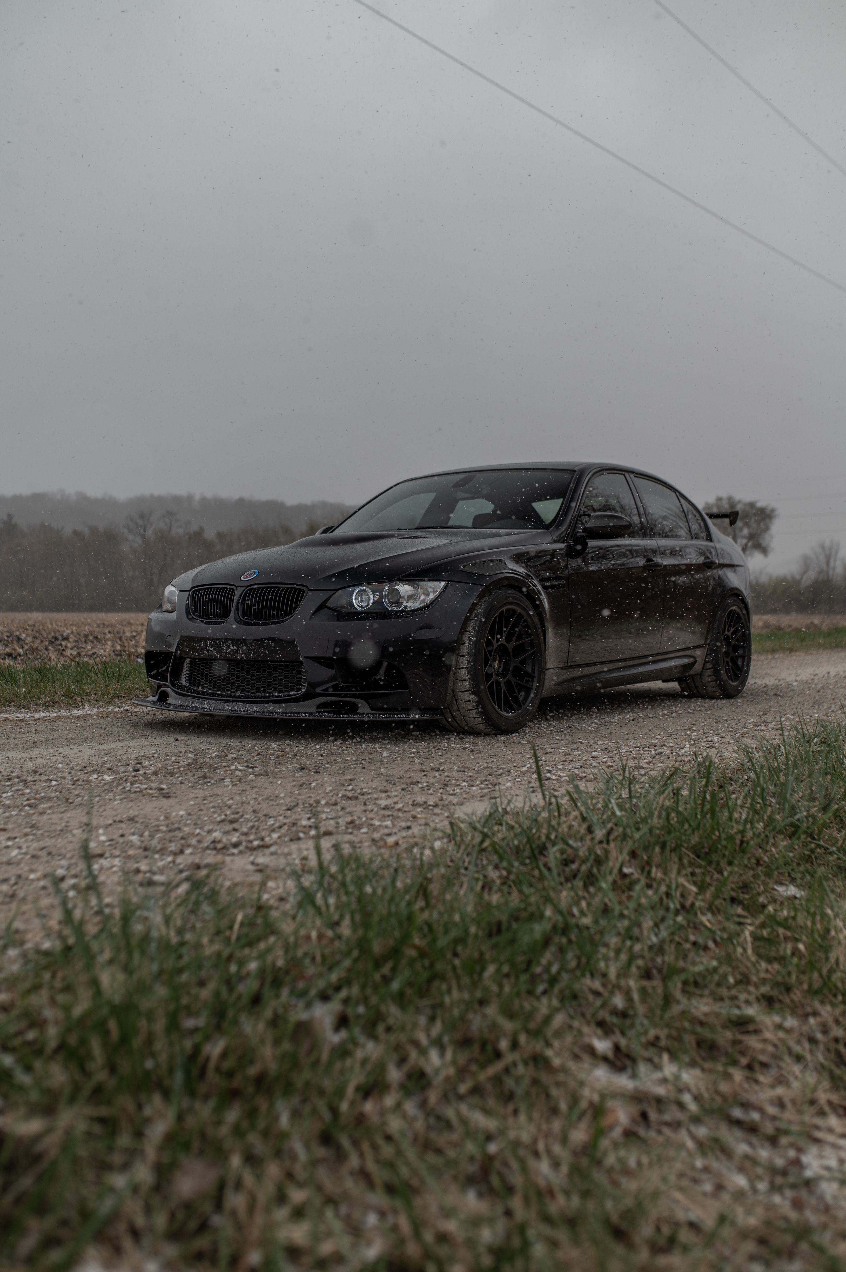 Black BMW E90 Sedan M3 with 18" ARC-8 Apex wheels in Satin Black