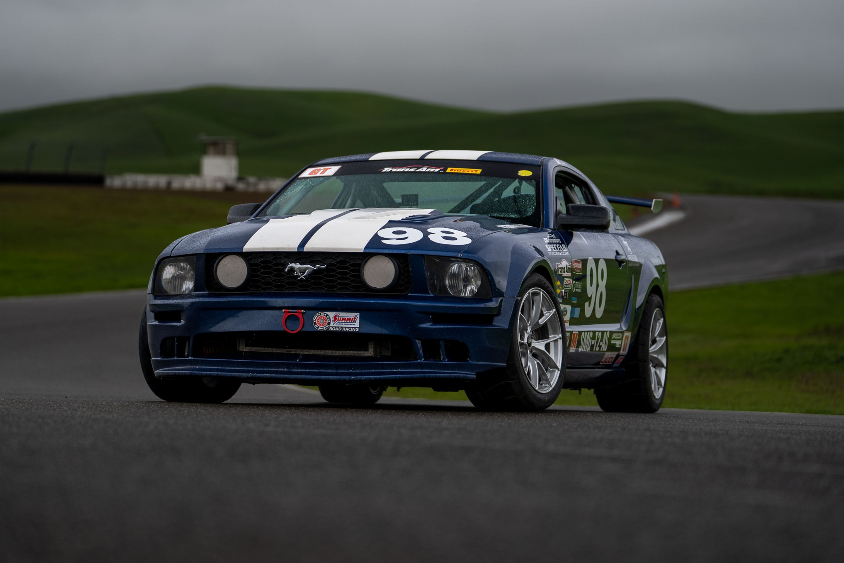 Blue Ford S197 Mustang GT with 18" VS-5RS Apex wheels in Brushed Clear