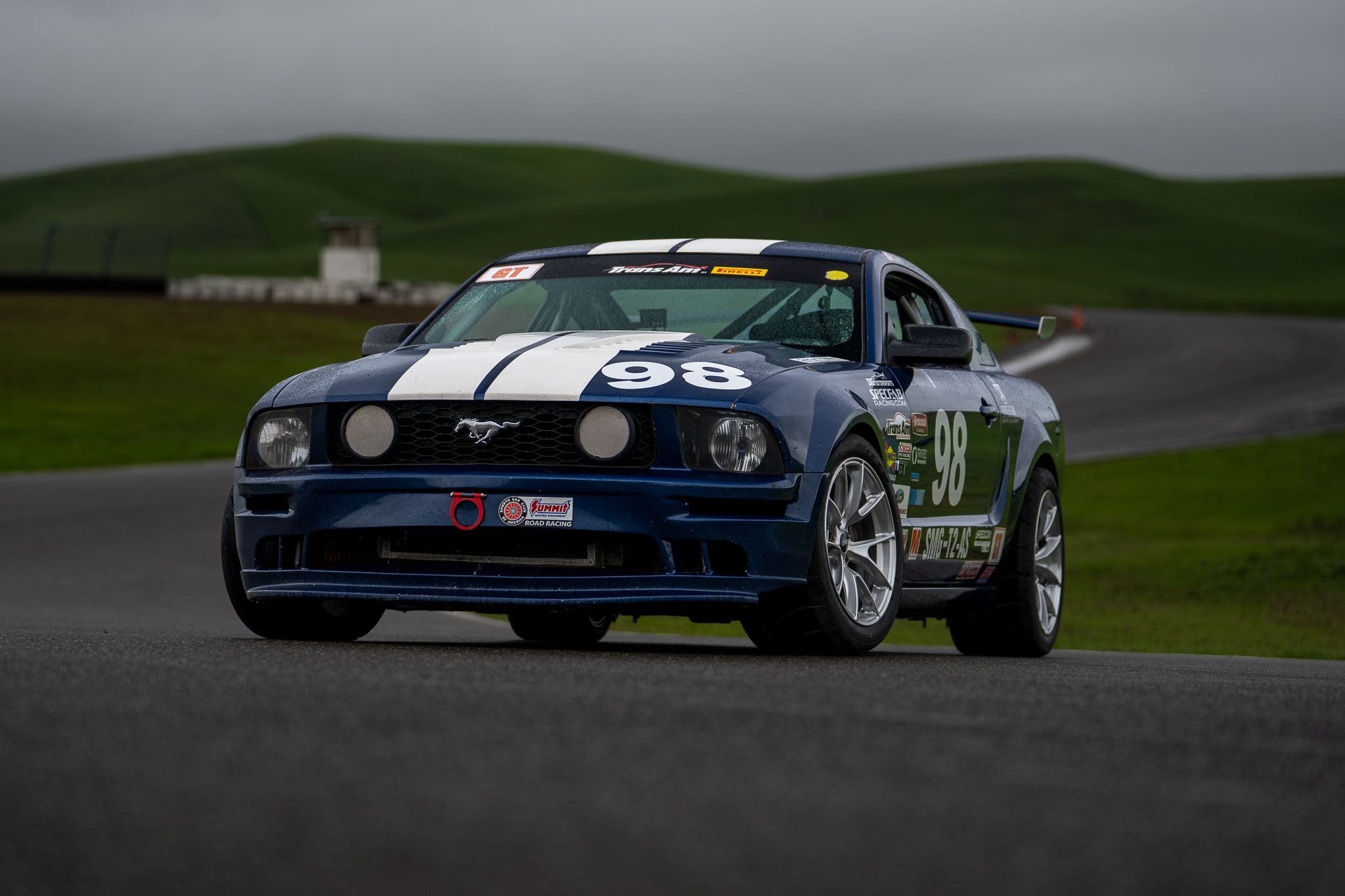 Blue Ford S197 Mustang GT with 18" VS-5RS Apex wheels in Brushed Clear