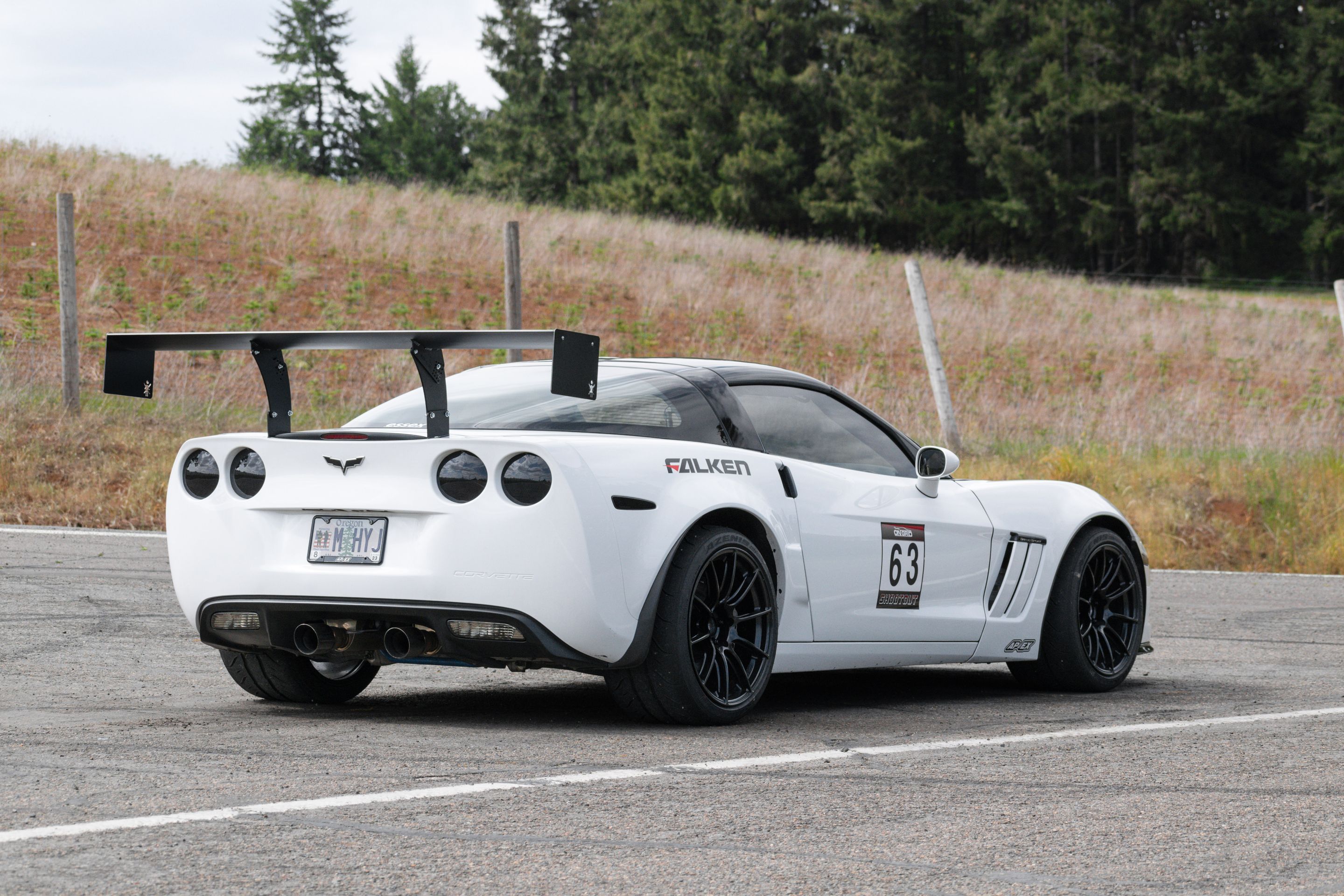 White Chevrolet C6 Corvette Grand Sport with 18"/19" SM-10RS Apex wheels in Satin Black