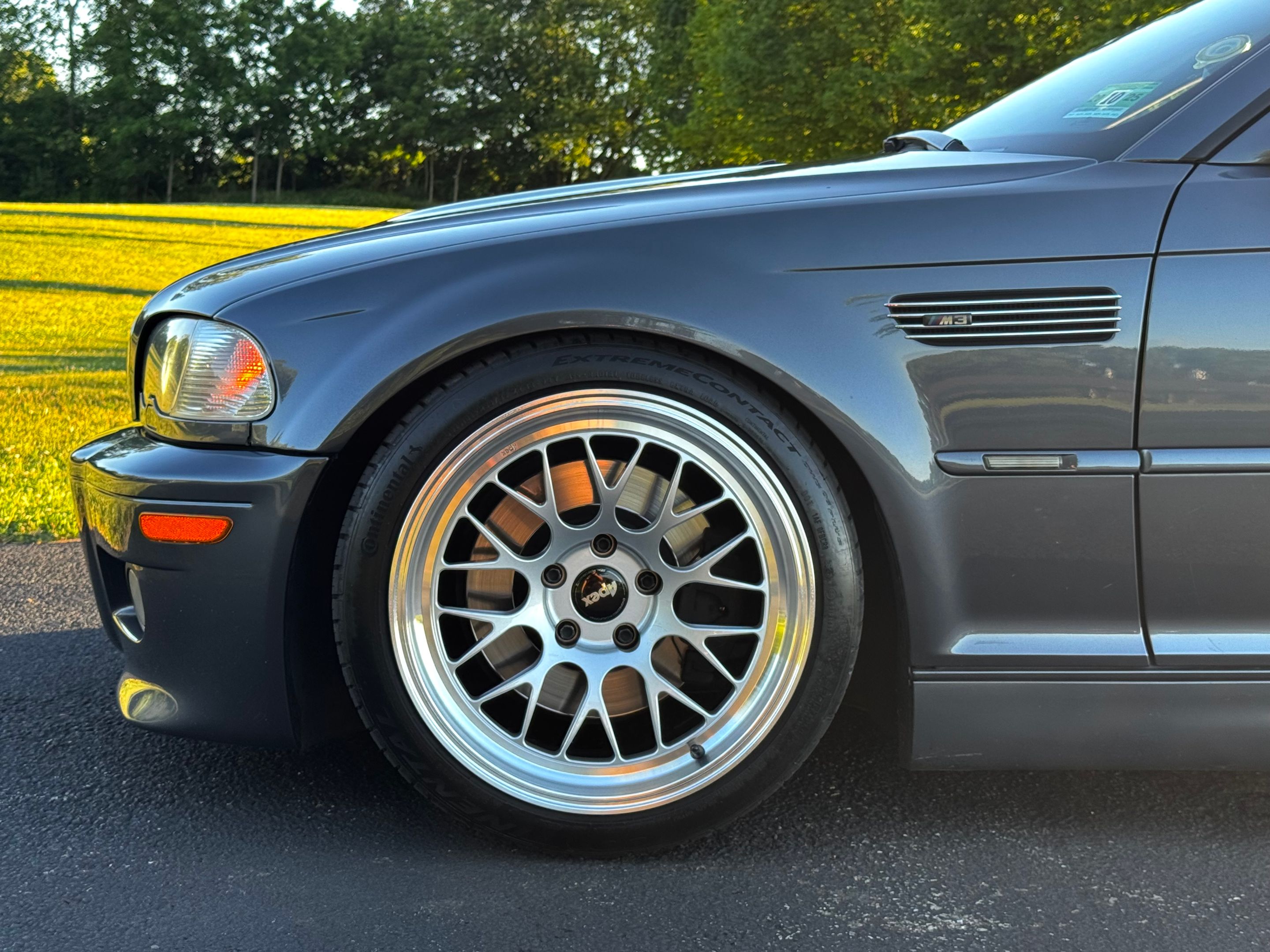 Grey BMW E46 M3 with 18" ML-10RT Apex wheels in Machined Lip Race Silver