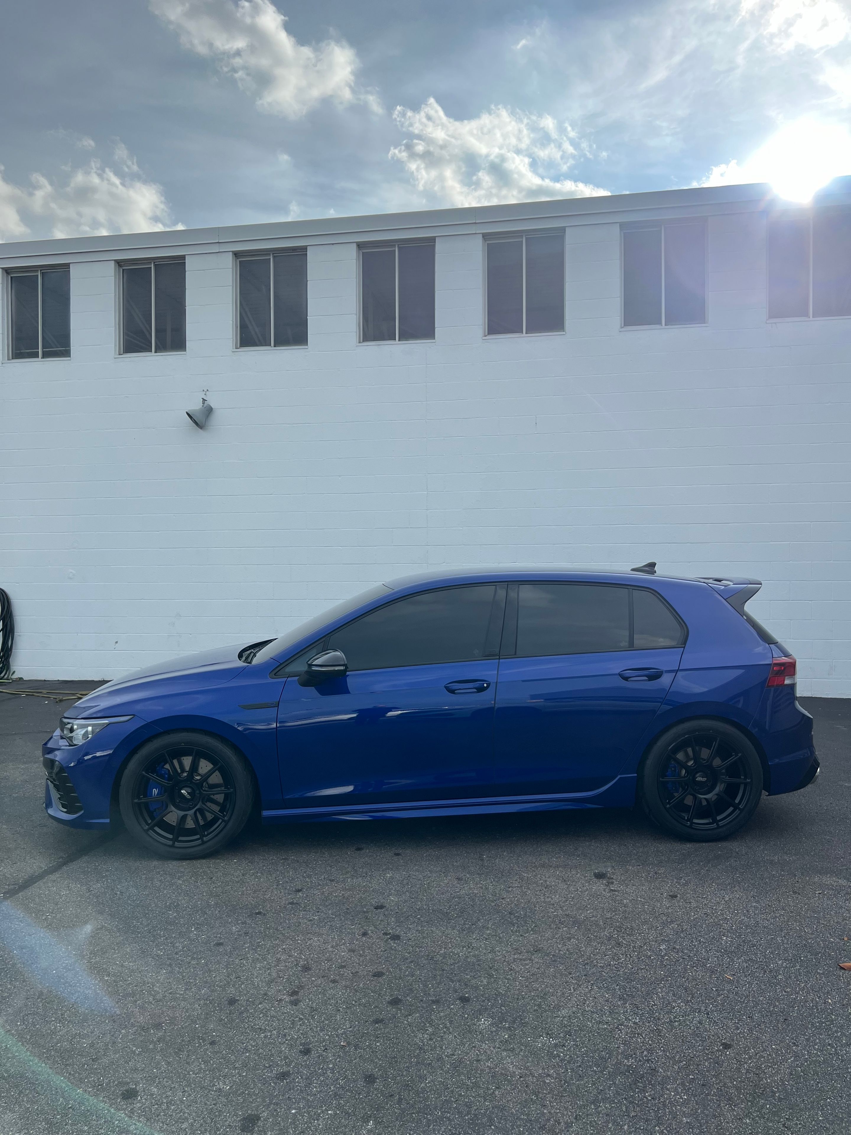 Blue VW MK8 Golf R with 18" SM-10 Apex wheels in Satin Black