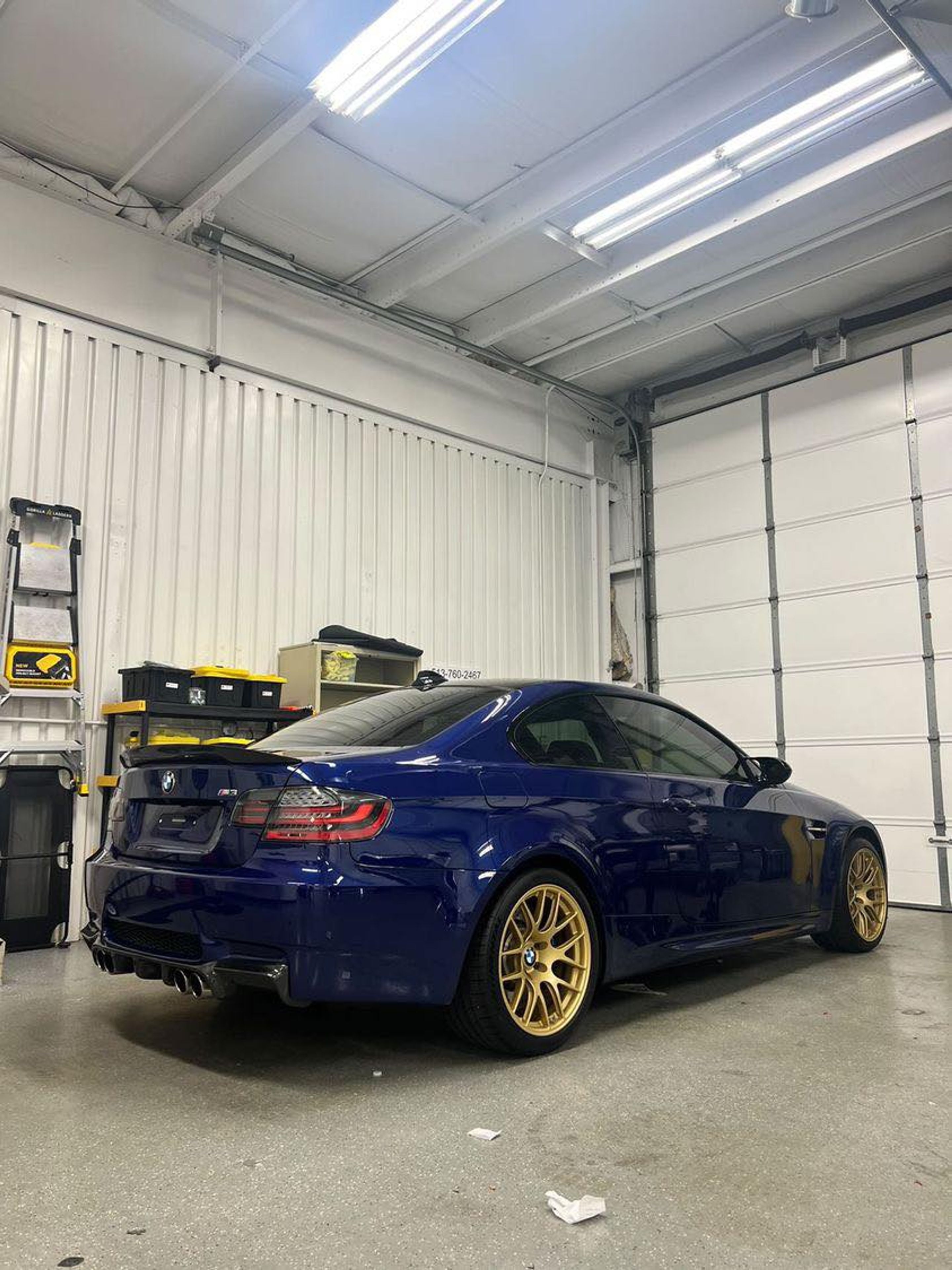 Blue BMW E92 Coupe M3 with 18" EC-7R Apex wheels in Satin Gold