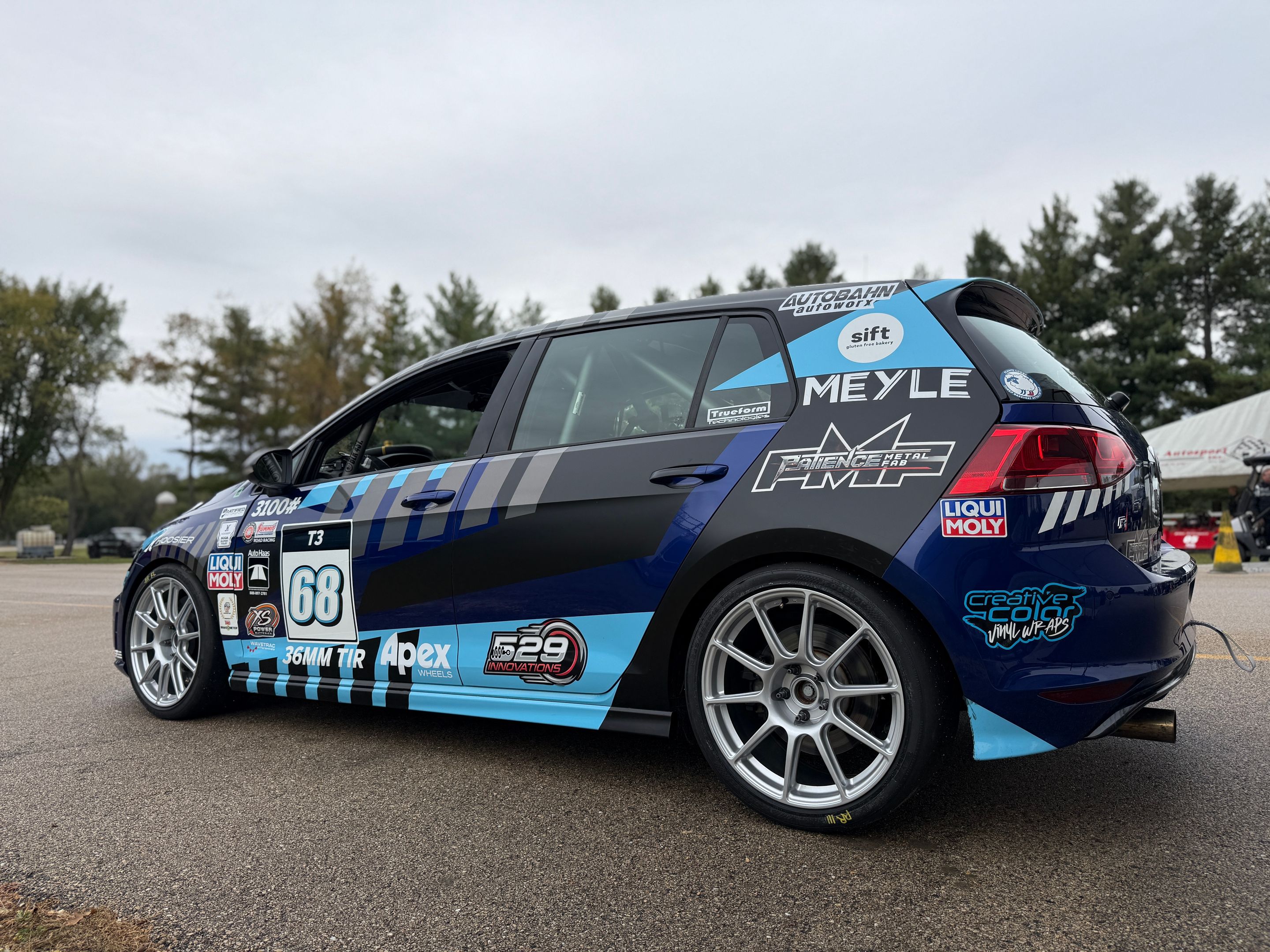 Race Livery VW MK7 Golf R with 18" SM-10 Apex wheels in Race Silver