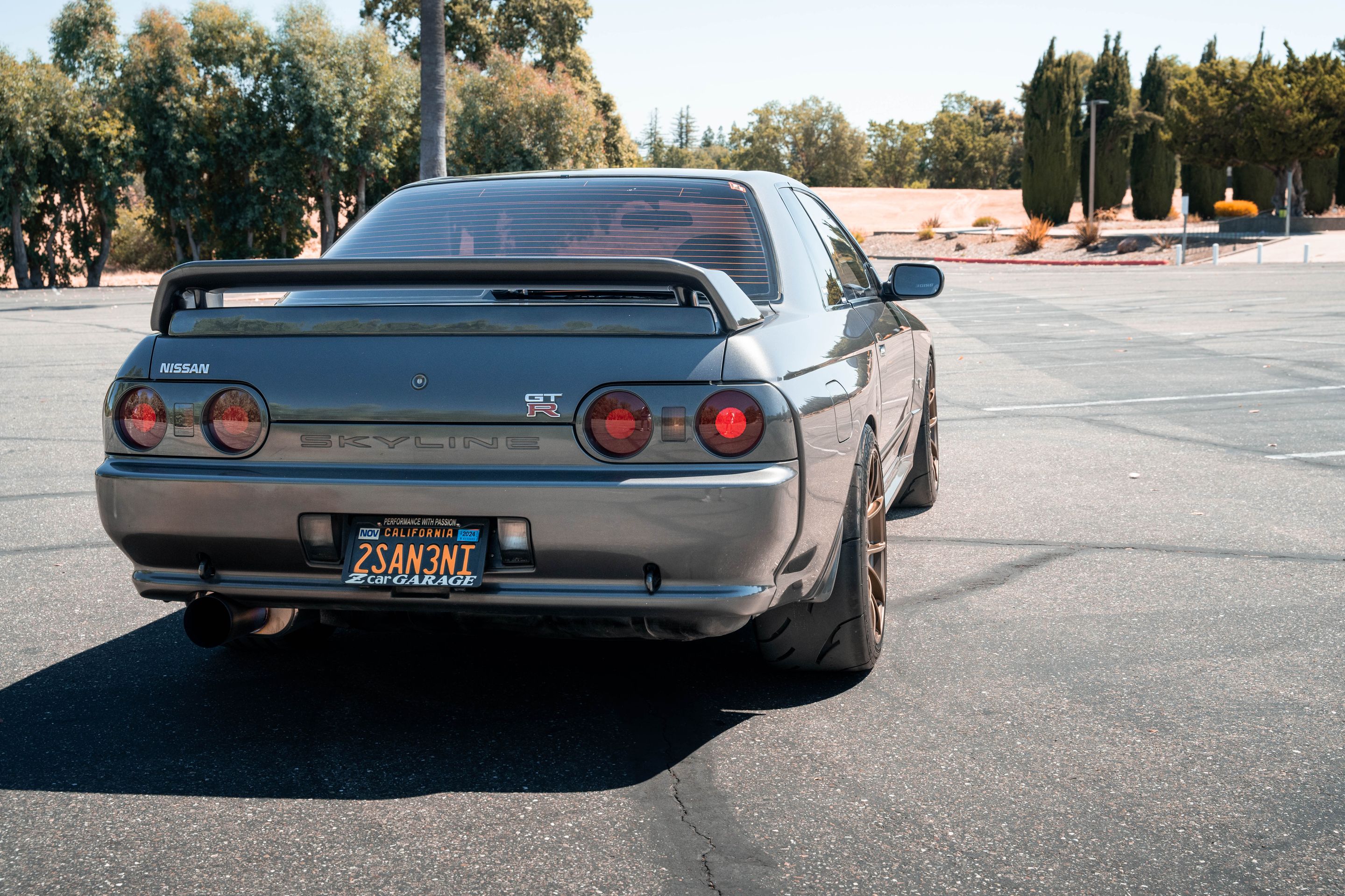 Grey Nissan R32 GT-R with 18" VS-5RS Apex wheels in Satin Bronze