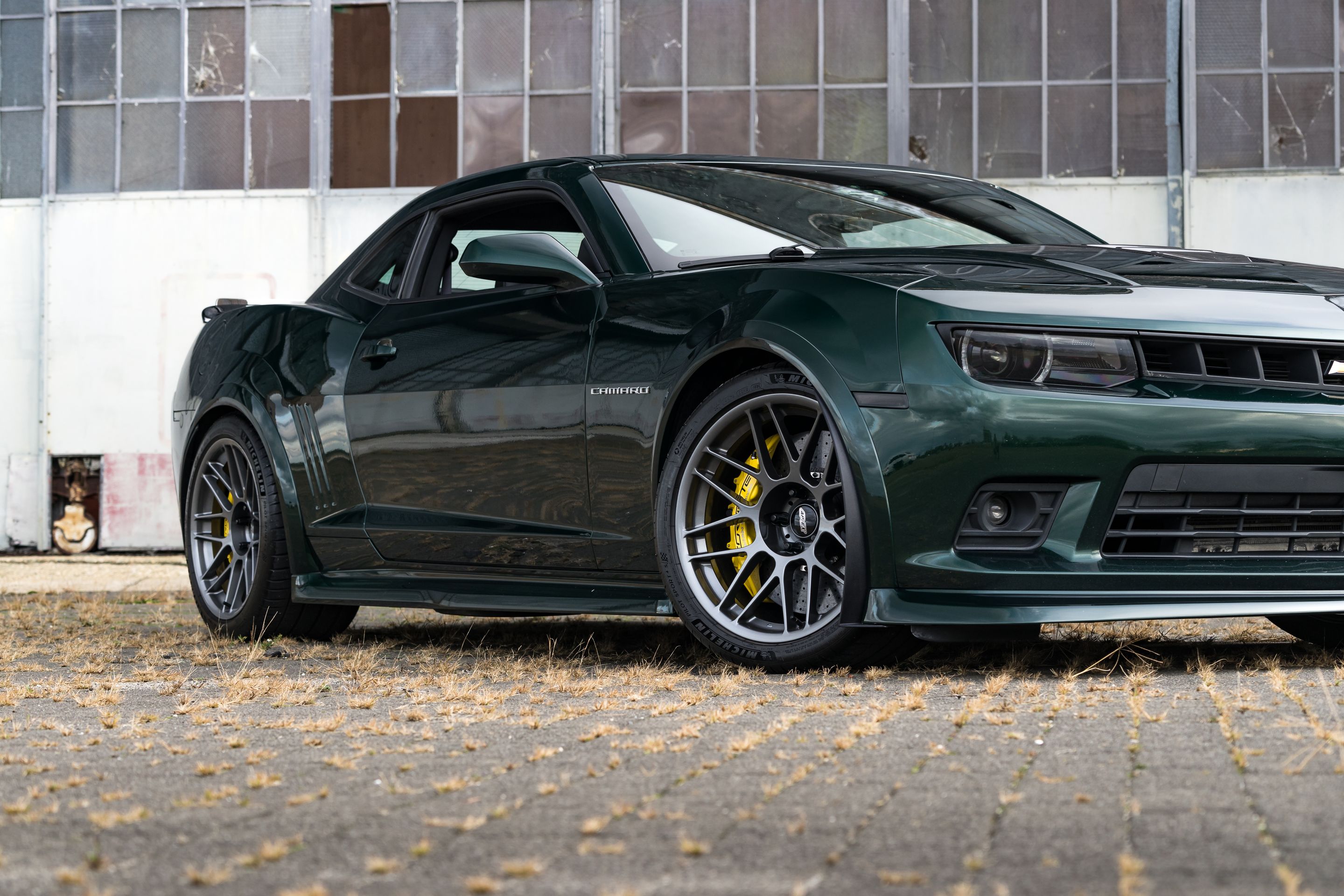 Green Chevrolet 5th Gen Camaro SS with 19" ARC-8 Apex wheels in Anthracite