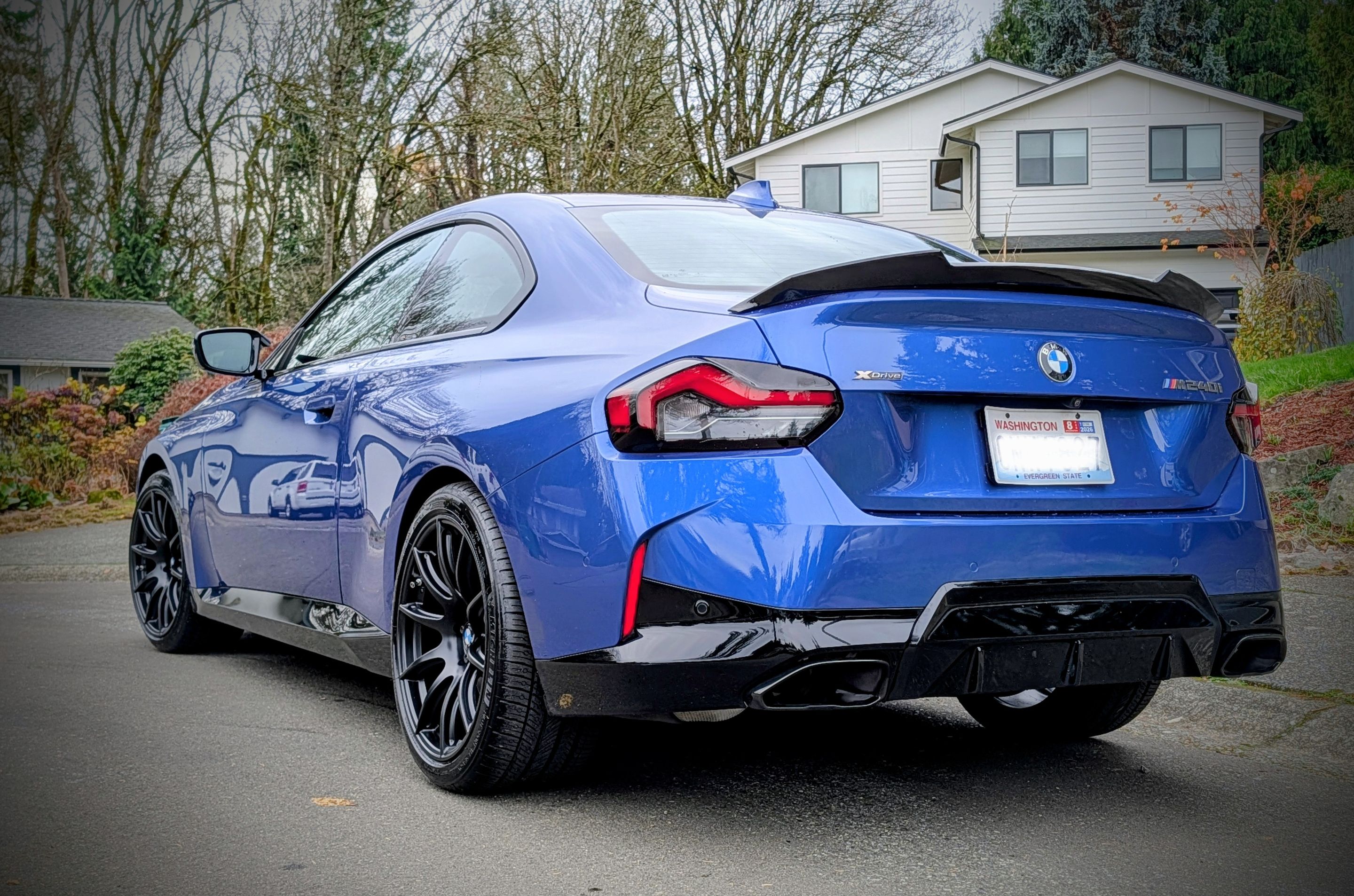 Blue BMW G42 2 Series with 19" SM-10 Apex wheels in Satin Black