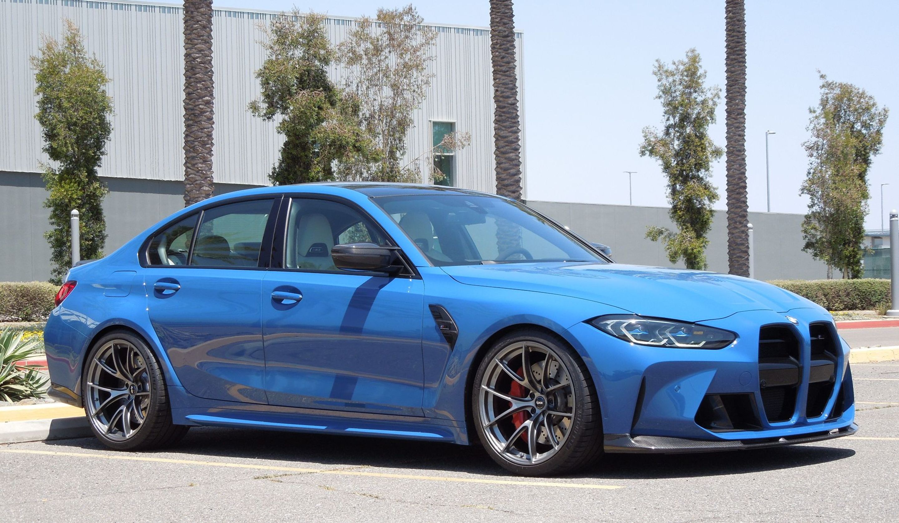 Blue BMW G80 M3 with 20" VS-5RS Apex wheels in Anthracite