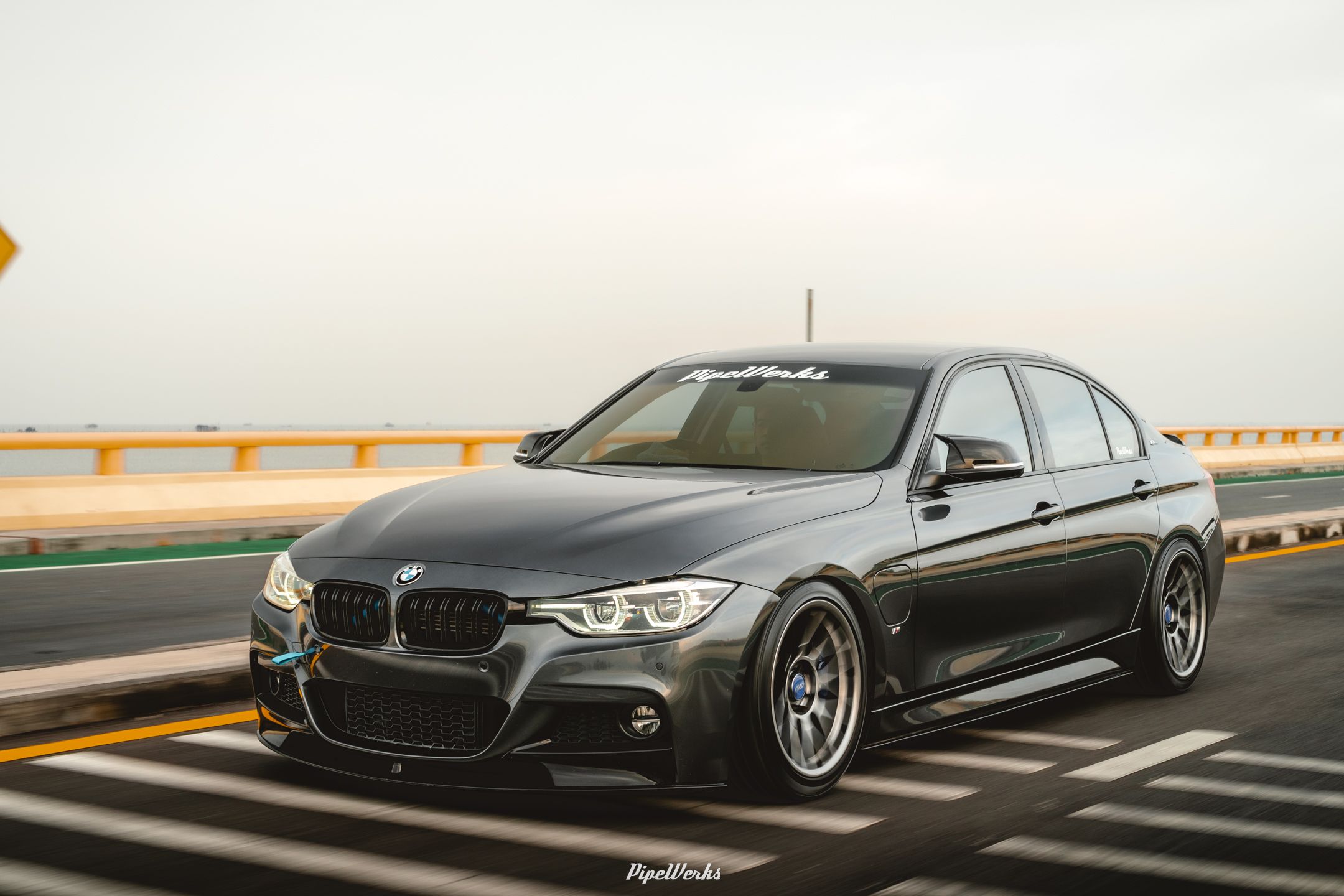 Grey BMW F30 Sedan 3 Series with 18" ARC-8 Apex wheels in Hyper Black