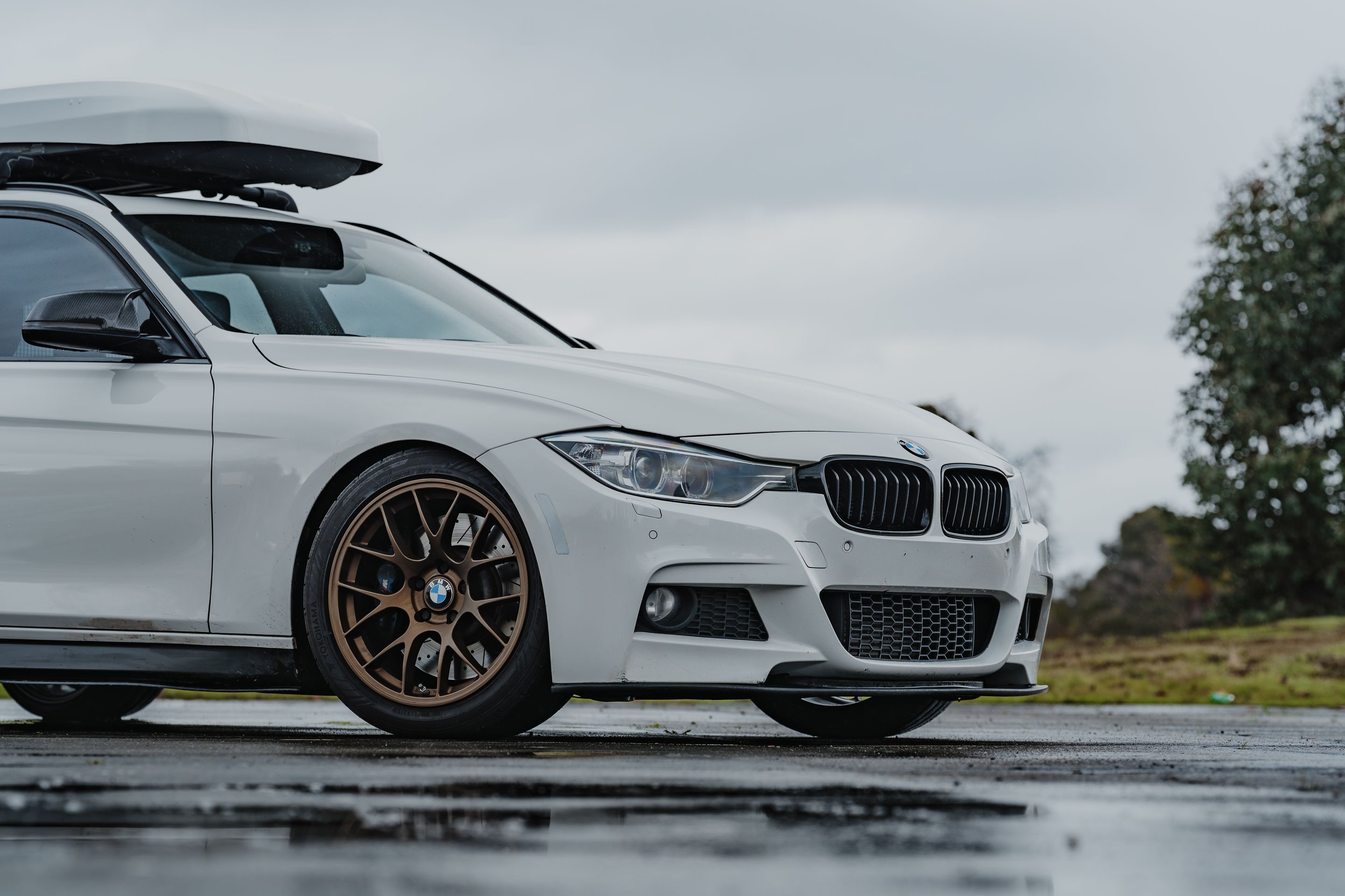 White BMW F31 Wagon 3 Series with 18" EC-7 Apex wheels in Satin Bronze
