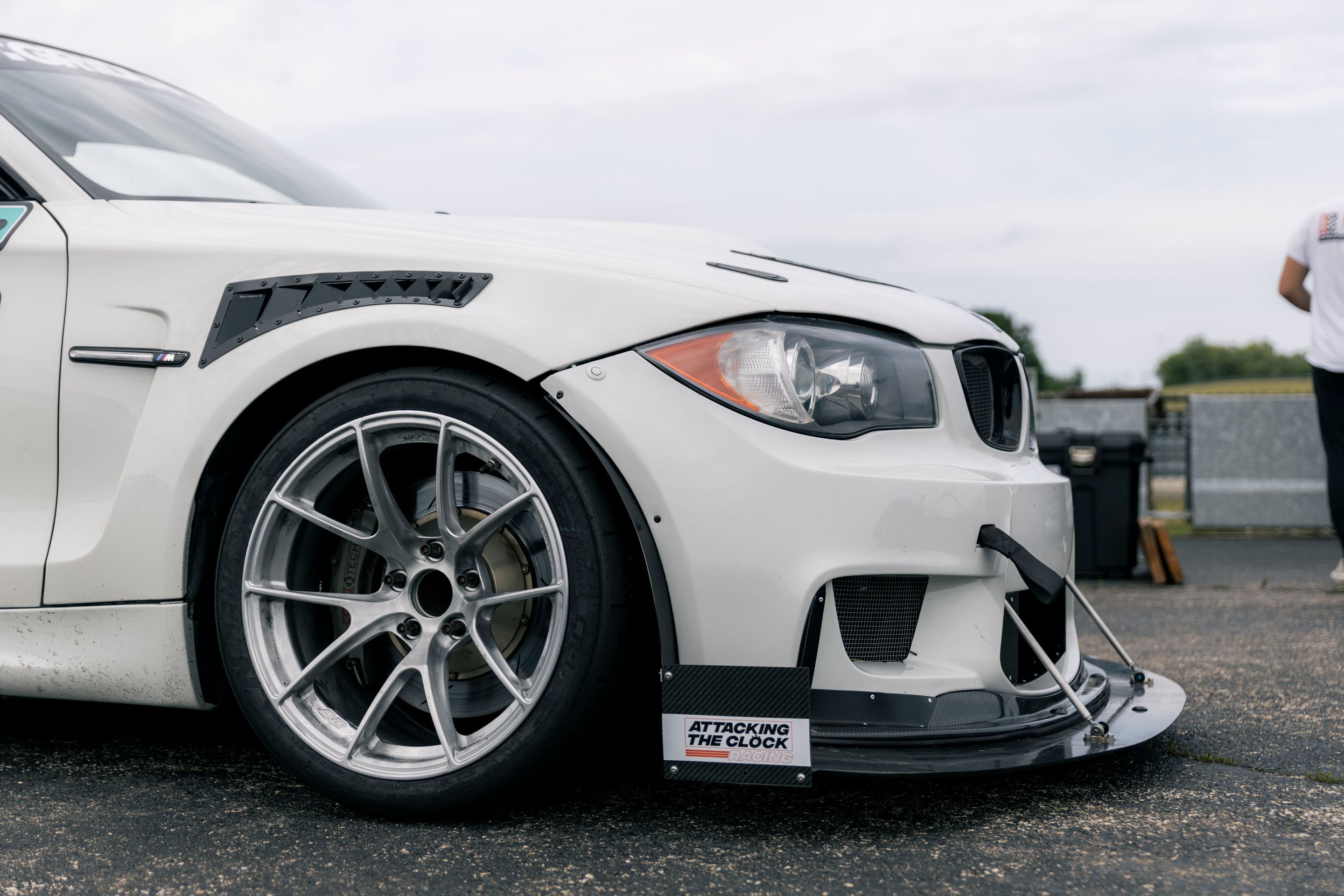 White BMW E82 1M with 18" VS-5RS Apex wheels in Brushed Clear