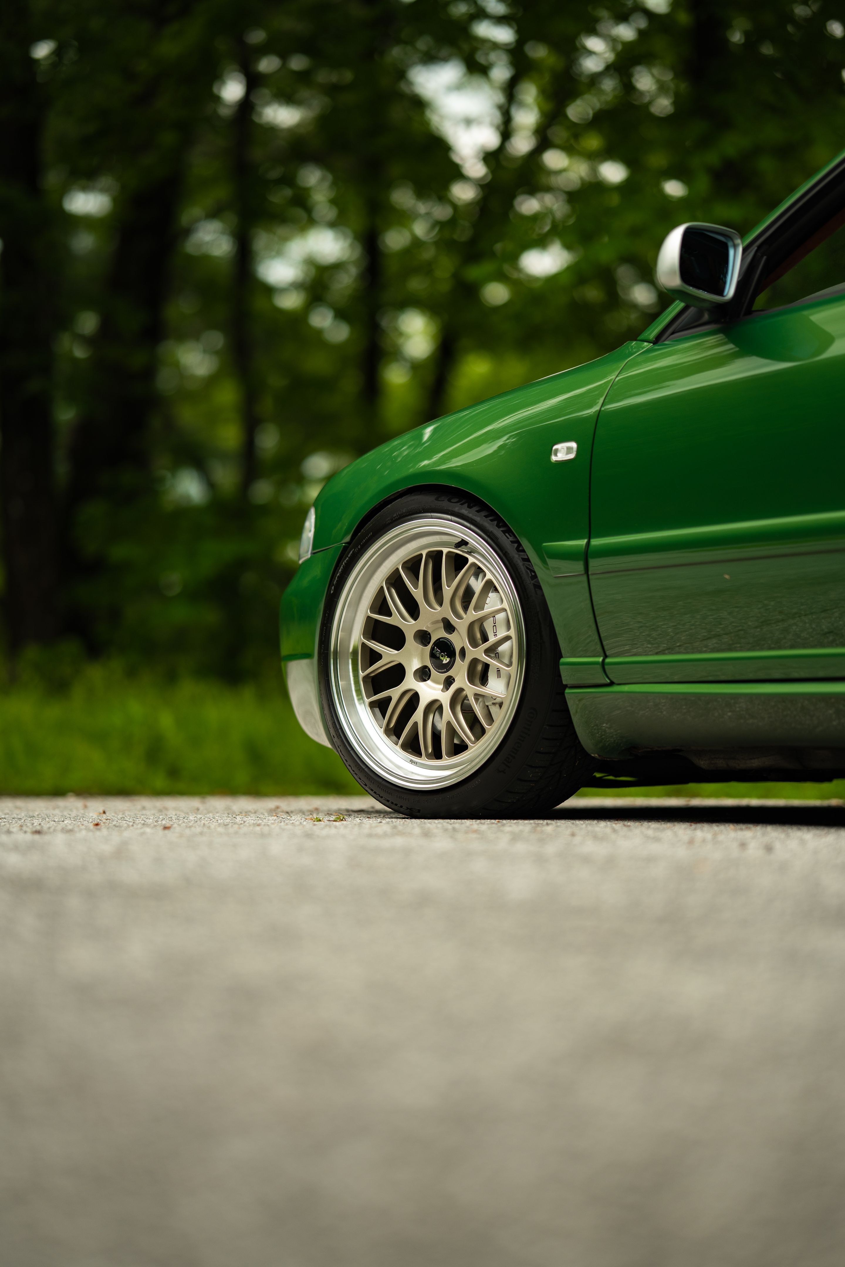 Green Audi B5 S4 Avant/Wagon with 18" ML-10RT Apex wheels in Machined Lip Gloss Motorsport Gold