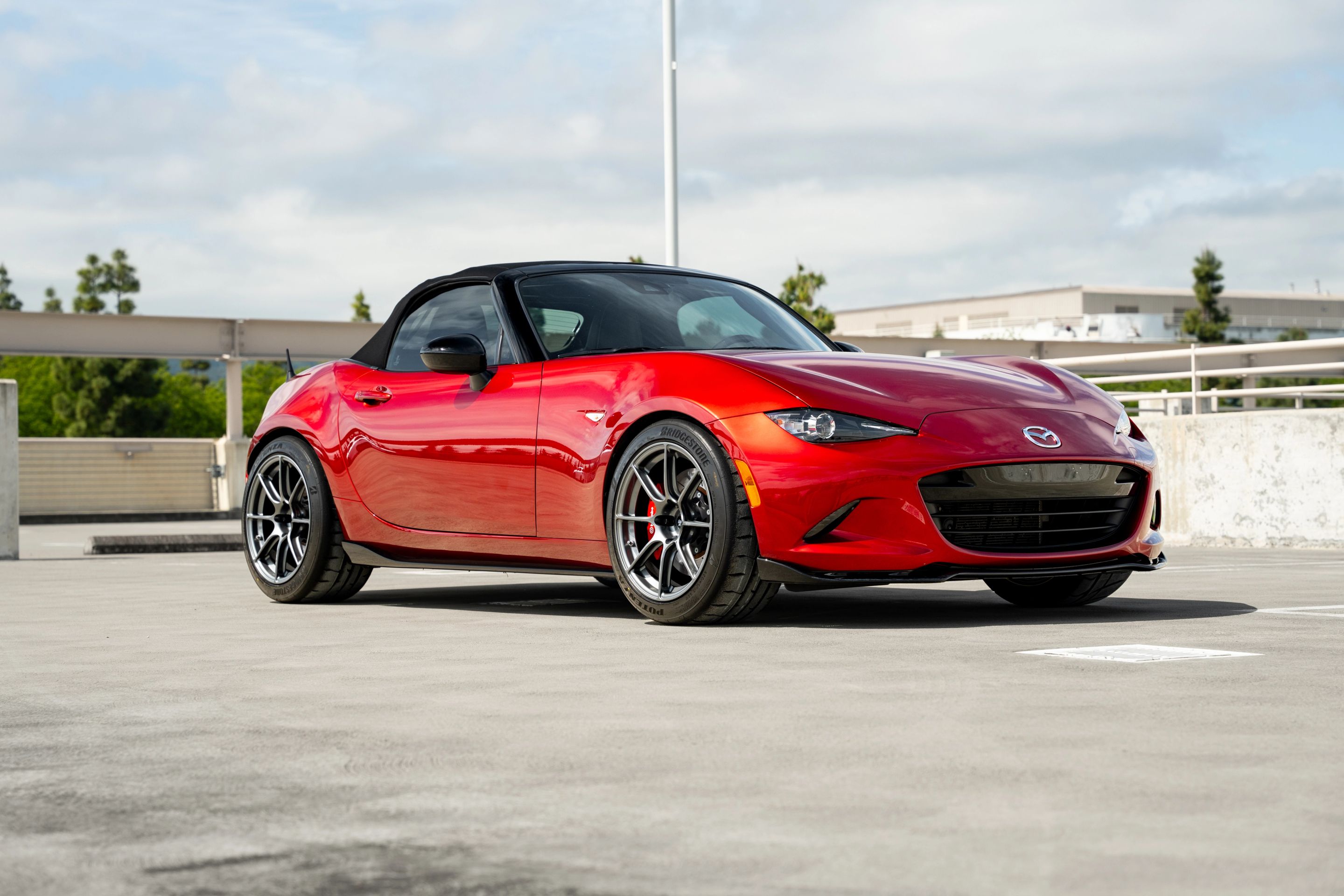Red Mazda ND MX-5 Miata with 17" SM-8RS Apex wheels in Anthracite