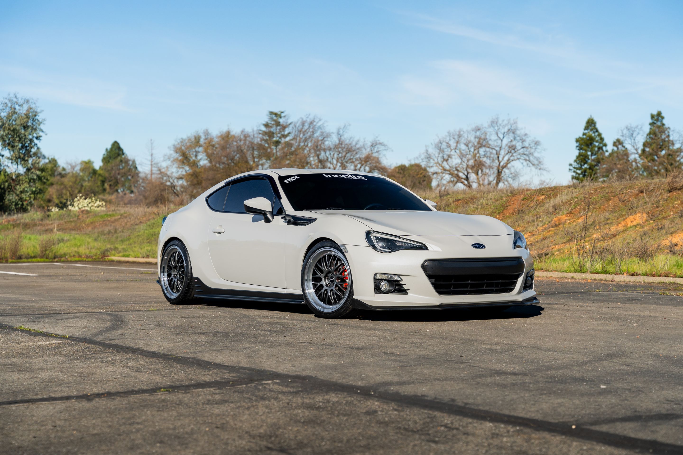 White Subaru ZC6 / Gen 1 BRZ with 18" ML-10RT Apex wheels in Machined Lip Anthracite