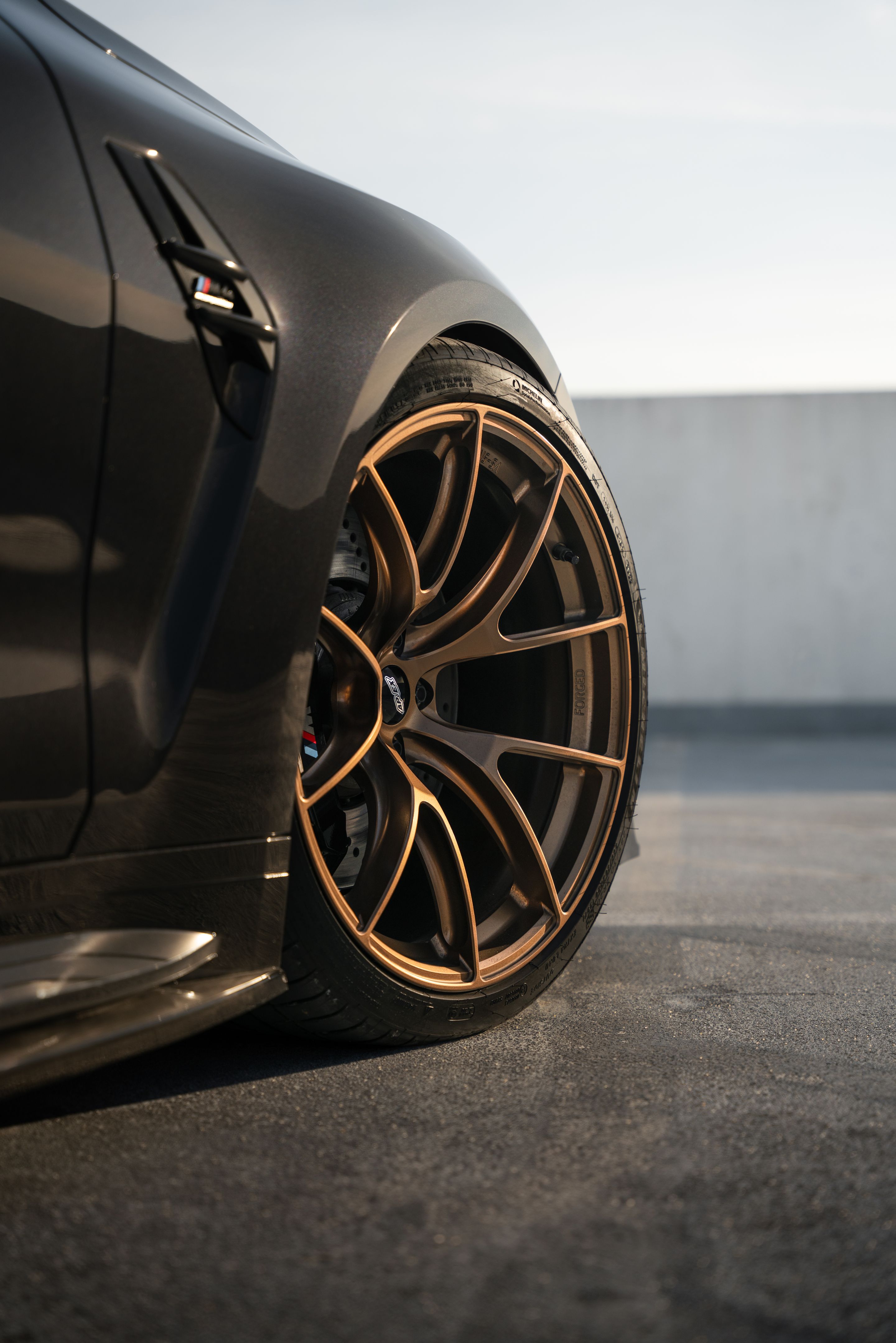 Black BMW G82 Coupe M4 with 20" VS-5RS Apex wheels in Satin Bronze