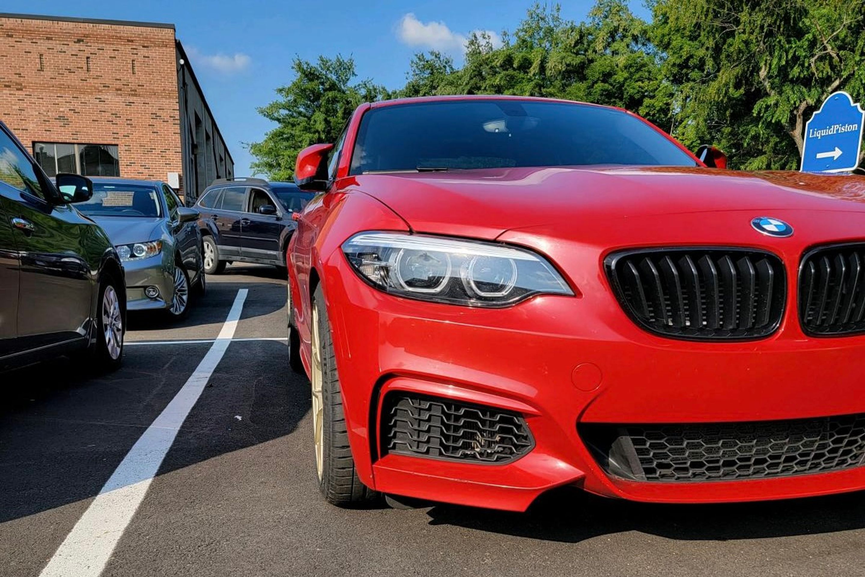 Red BMW F22 Coupe 2 Series with 18" VS-5RS Apex wheels in Motorsport Gold