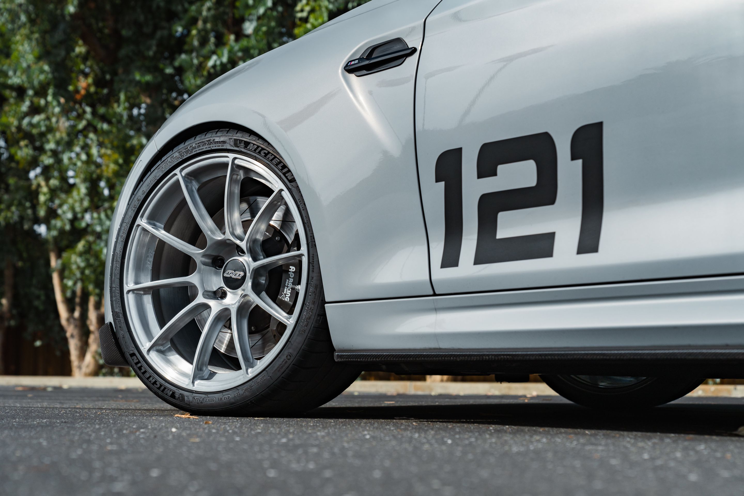 Silver BMW F87 M2 with 19" SM-10RS Apex wheels in Brushed Clear