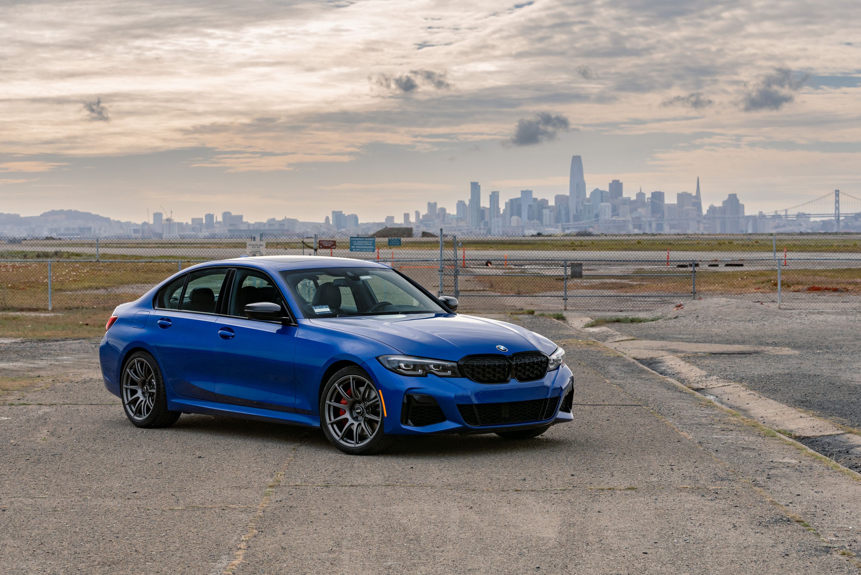 Blue BMW G20 Sedan 3 Series with 19" SM-10 Apex wheels in Anthracite